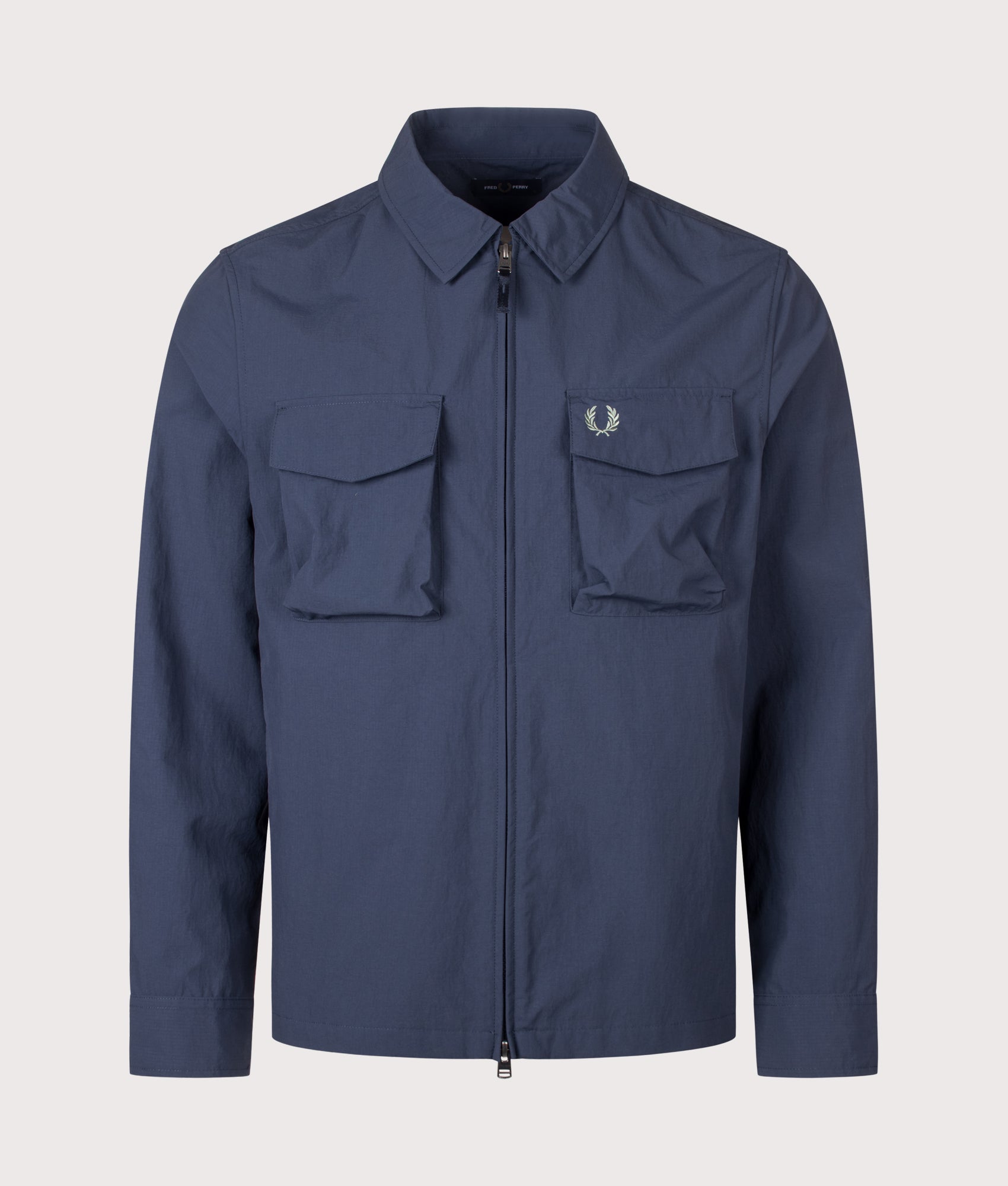 Fred Perry Ripstop Pocket Overshirt in Dark Airforce at EQVVS Menswear. Front shot.