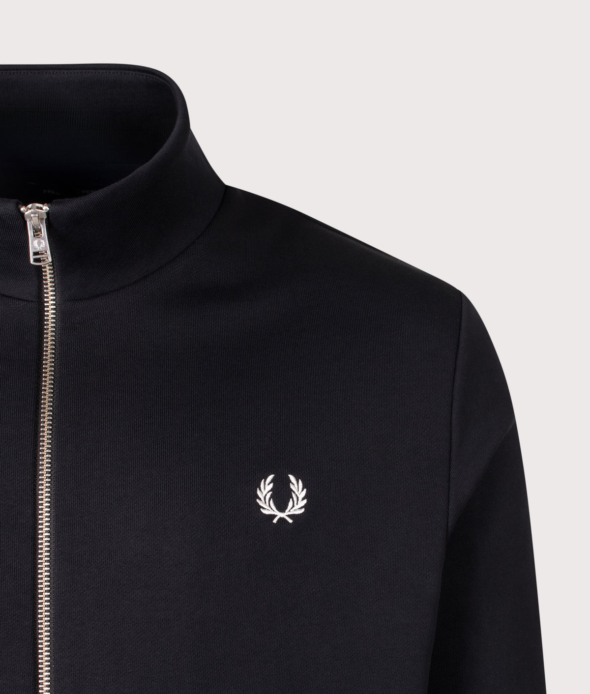 Fred Perry Regular Fit Track Top in Black at EQVVS Menswear. Detail shot.