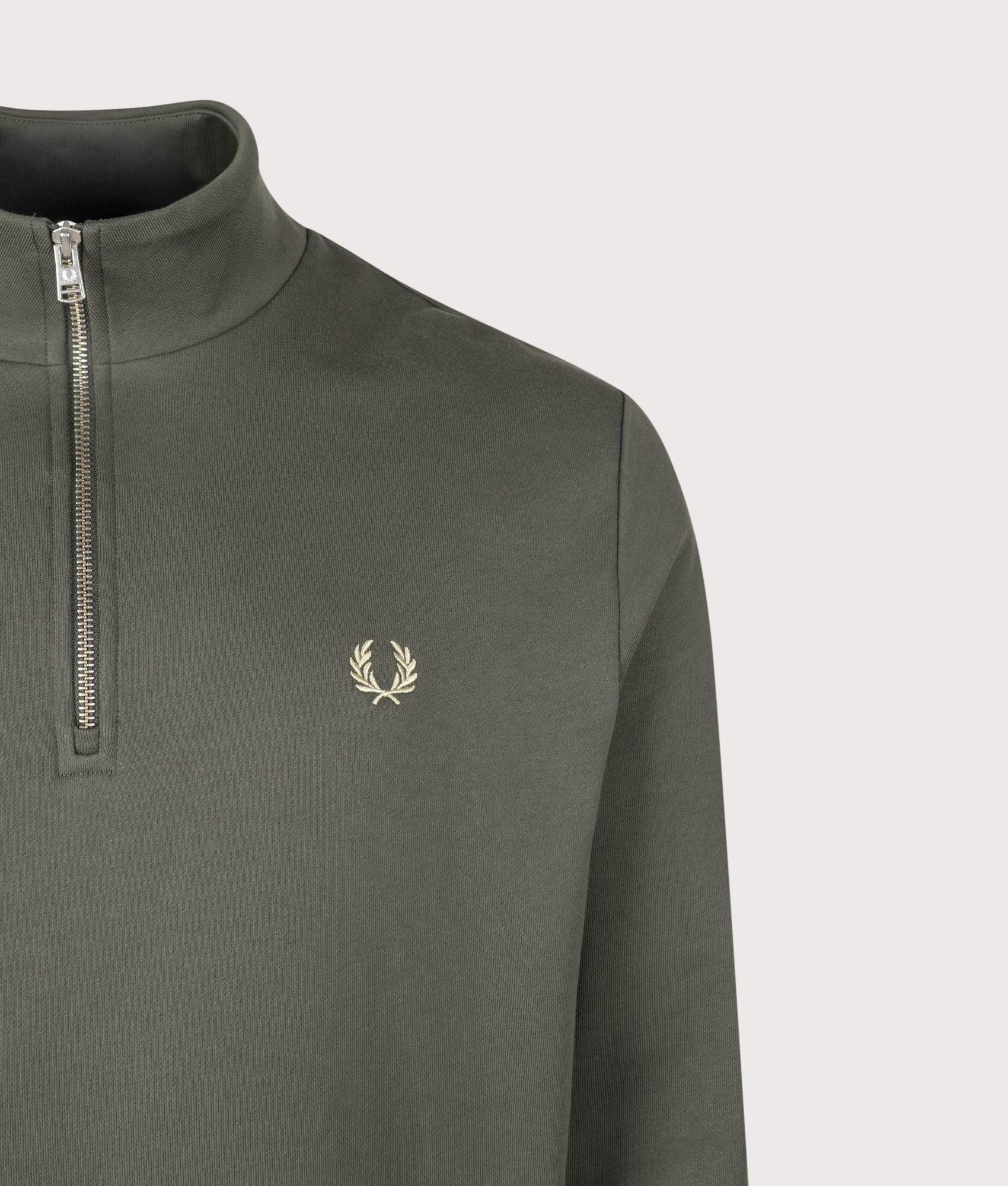 Fred Perry Regular Fit Quarter Zip Sweatshirt in Field Green and Oatmeal at EQVVS Menswear. Detail shot.