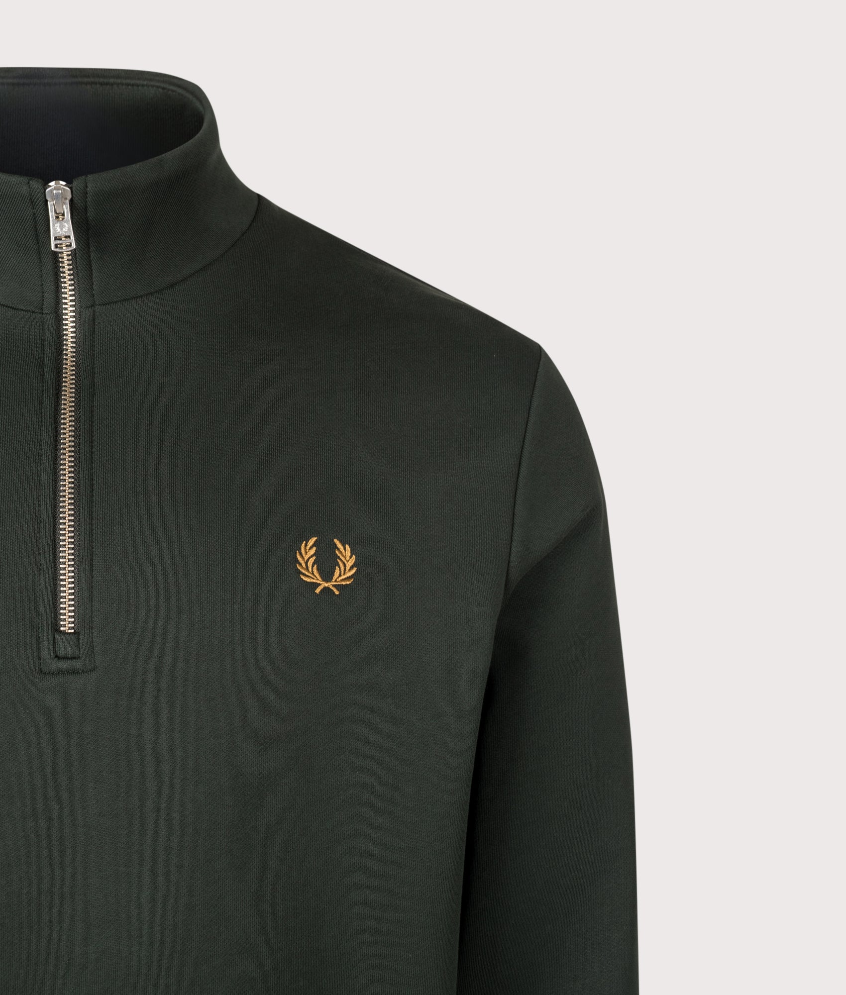 Fred Perry Regular Fit Quarter Zip Sweatshirt in Night Green, Dusky Blue and Dark Caramel at EQVVS Menswear. Detail shot.
