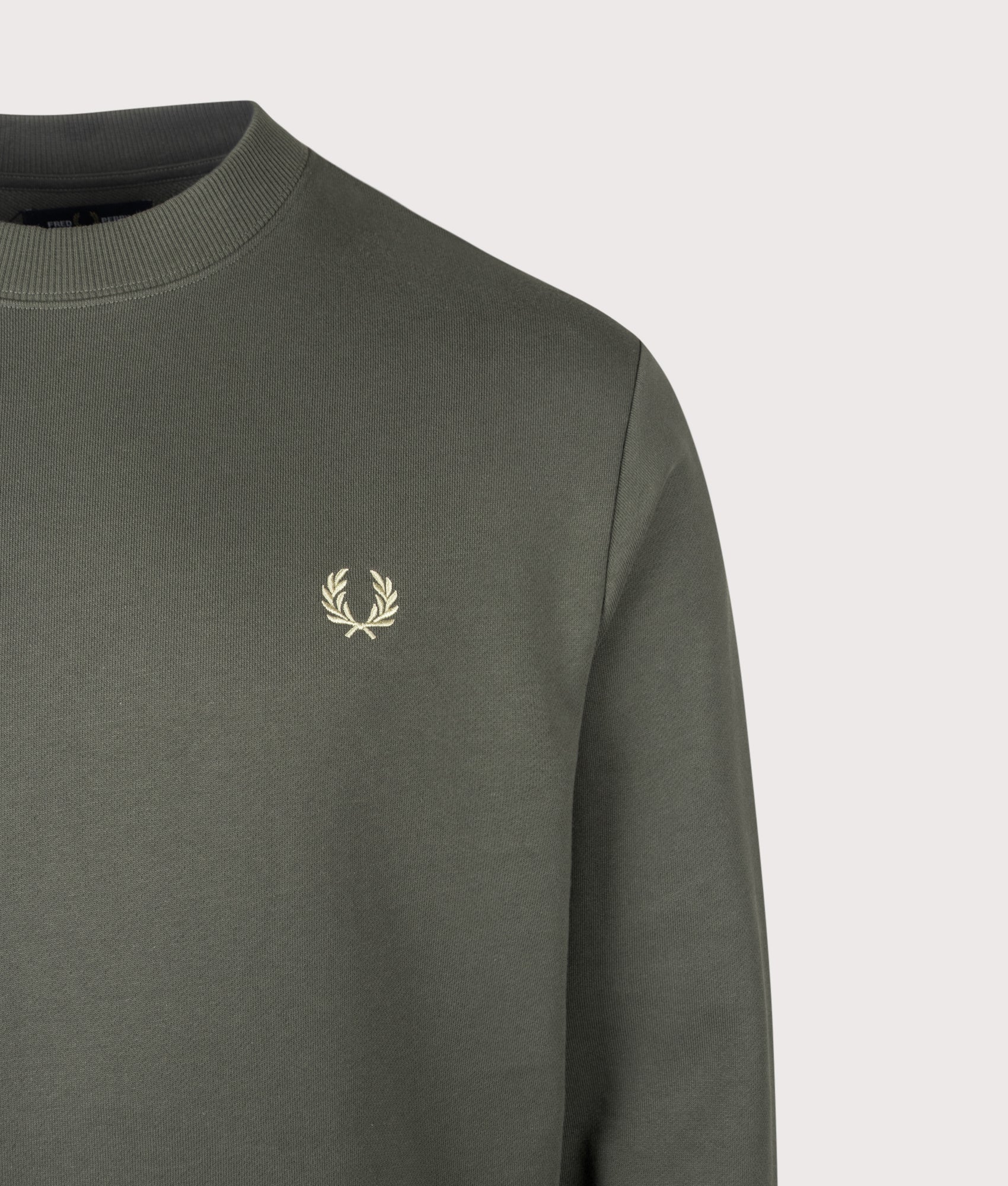 Fred Perry Regular Fit Crew Neck Sweatshirt in Field Green and Oatmeal at EQVVS Menswear. Detail shot.