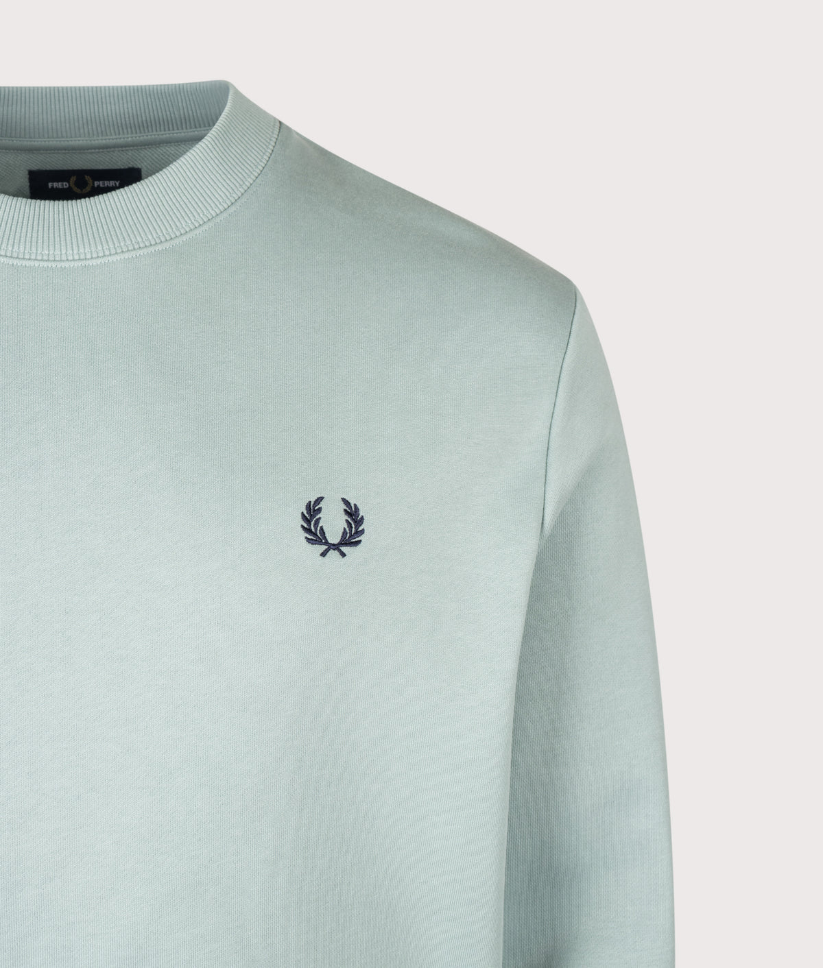 Fred Perry Regular Fit Crew Neck Sweatshirt in Silver Blue and Dark Airforce at EQVVS Menswear. Detail shot.