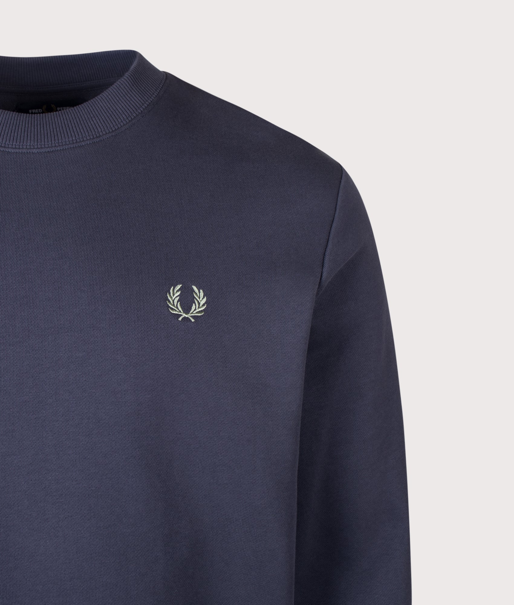Fred Perry Regular Fit Crew Neck Sweatshirt in Dark Airforce, Ecru and Seagrass at EQVVS Menswear. Detail shot.