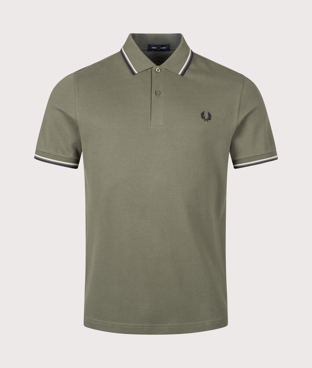 Fred Perry Twin Tipped Polo Shirt in Laurel Wreath Green, Slate and Navy at EQVVS Menswear. Front shot.
