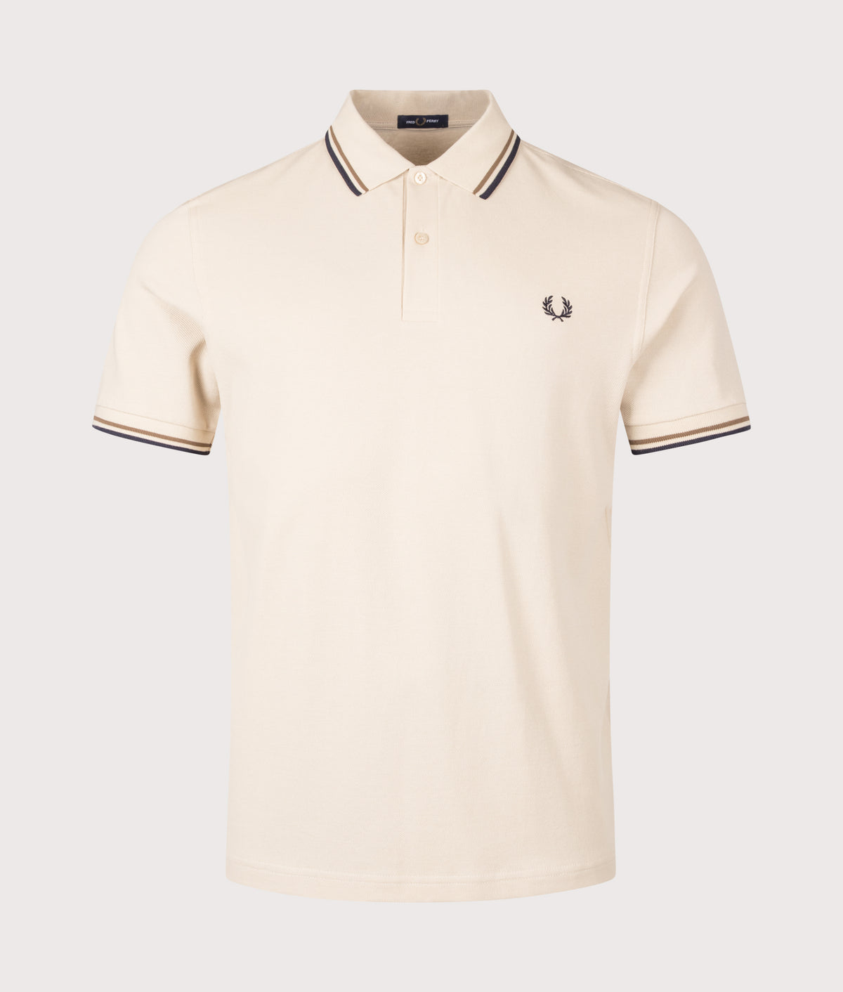 Fred Perry Twin Tipped Polo Shirt in Oatmeal, Bronze and Navy at EQVVS Menswear. Front shot.