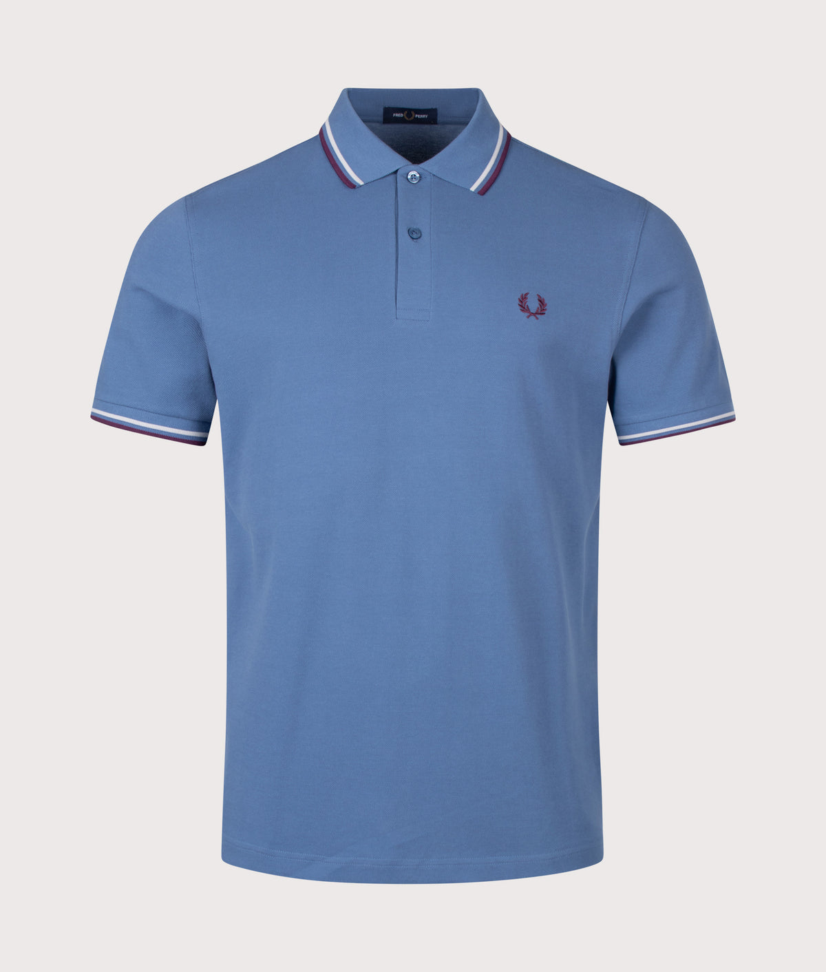 Fred Perry Twin Tipped Polo Shirt in Ace Blue, Slate and Plum at EQVVS Menswear. Front shot.