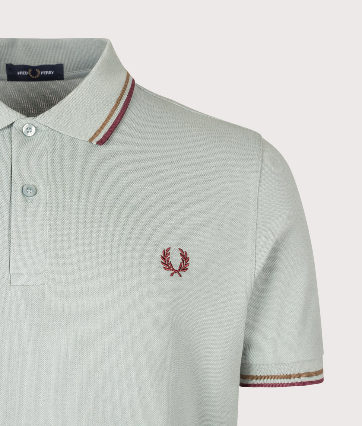 Fred Perry Twin Tipped Polo Shirt in Silver Blue, Bronze and Oxblood at EQVVS Menswear. Detail shot.