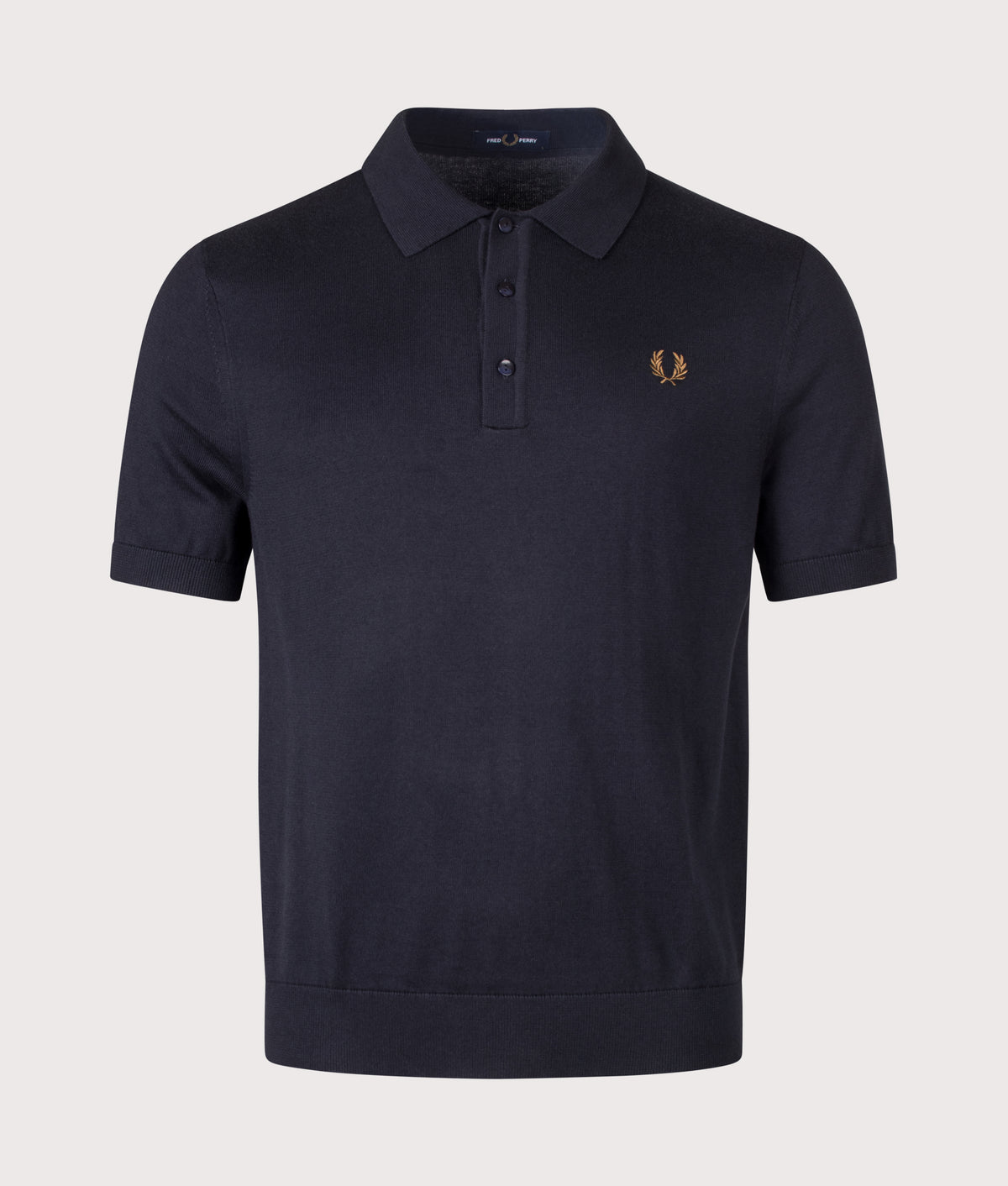 Fred Perry Regular Fit Supima Cotton Knitted Polo Shirt in Navy at EQVVS Menswear. Front shot.