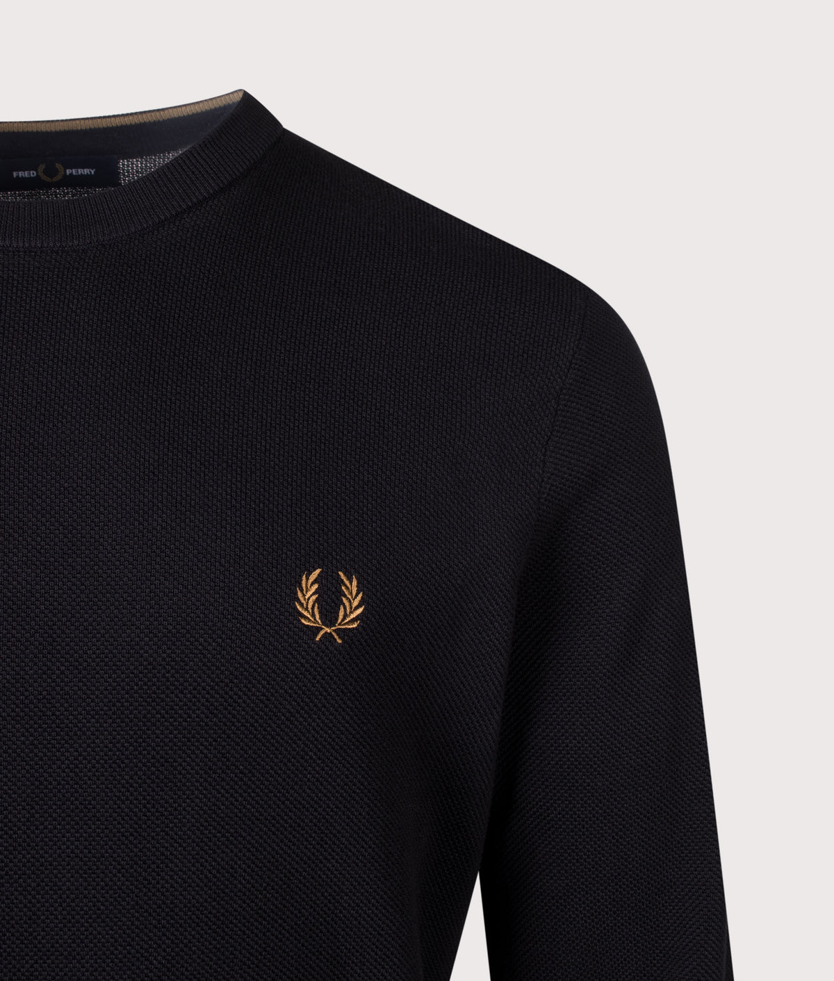 Fred Perry Regular Fit Piqué Stitch Jumper in Black at EQVVS Menswear. Detail shot.