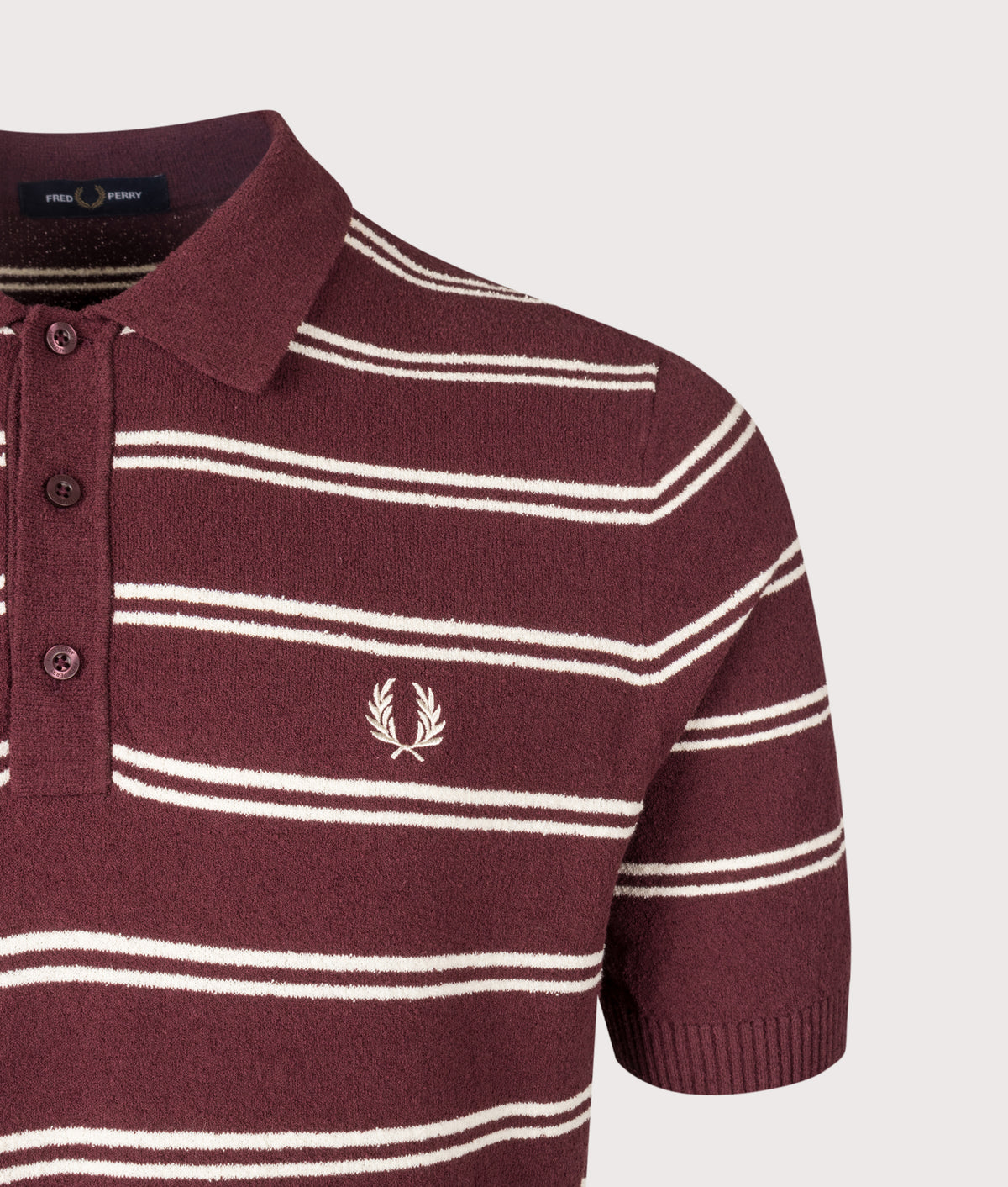 Fred Perry Regular Fit Boucle Stripe Knitted Shirt in Oxblood at EQVVS Menswear. Detail shot.