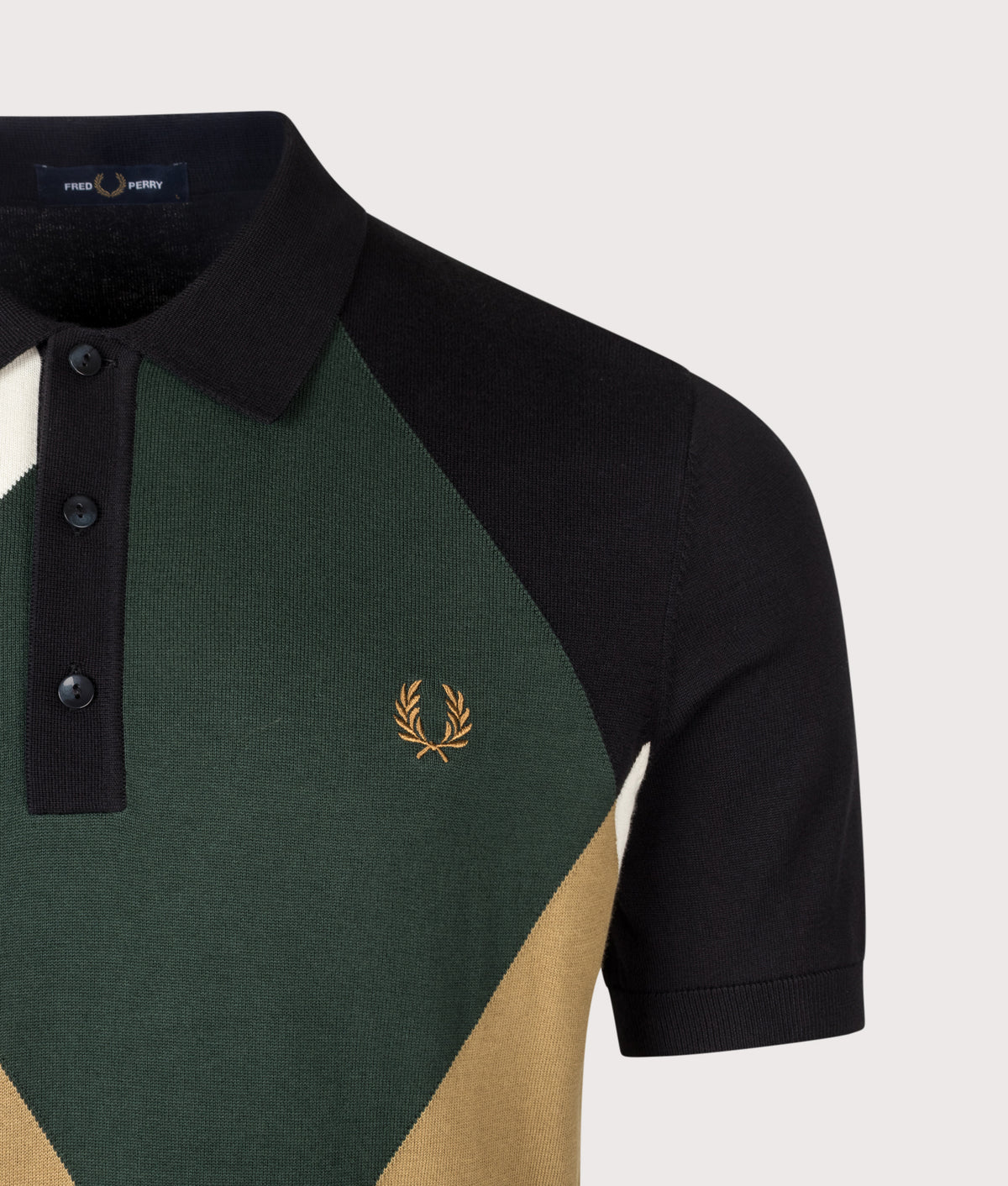 Fred Perry Regular Fit Offset Argyle Knitted Shirt in Black at EQVVS Menswear. Detail shot.