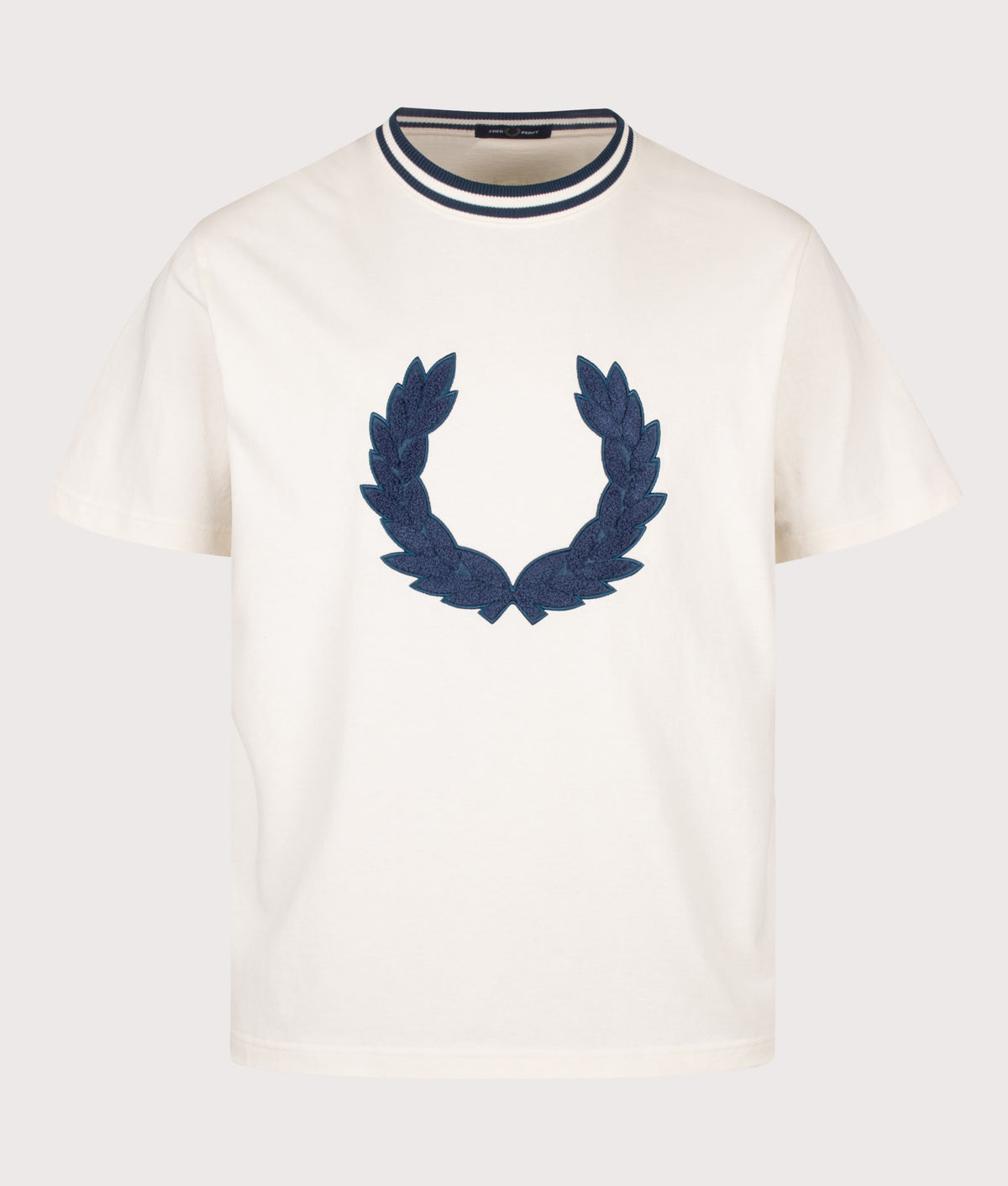 Fred Perry Relaxed Fit Laurel Wreath Patch T-Shirt in Ecru at EQVVS Menswear. Front shot.