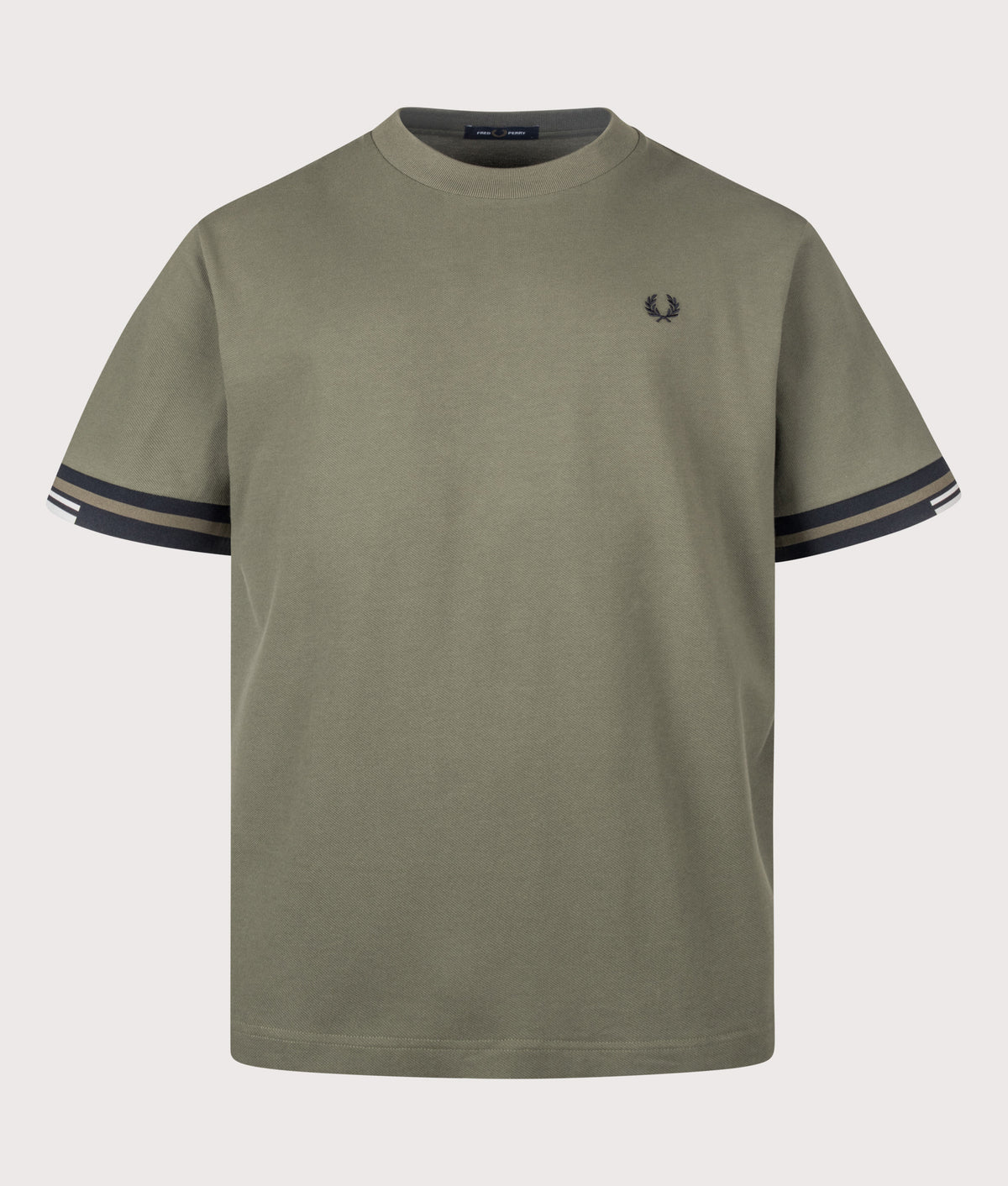 Fred Perry Relaxed Fit Tipped Cuff Piqué T-Shirt in Laurel Wreath Green at EQVVS Menswear. Front shot.
