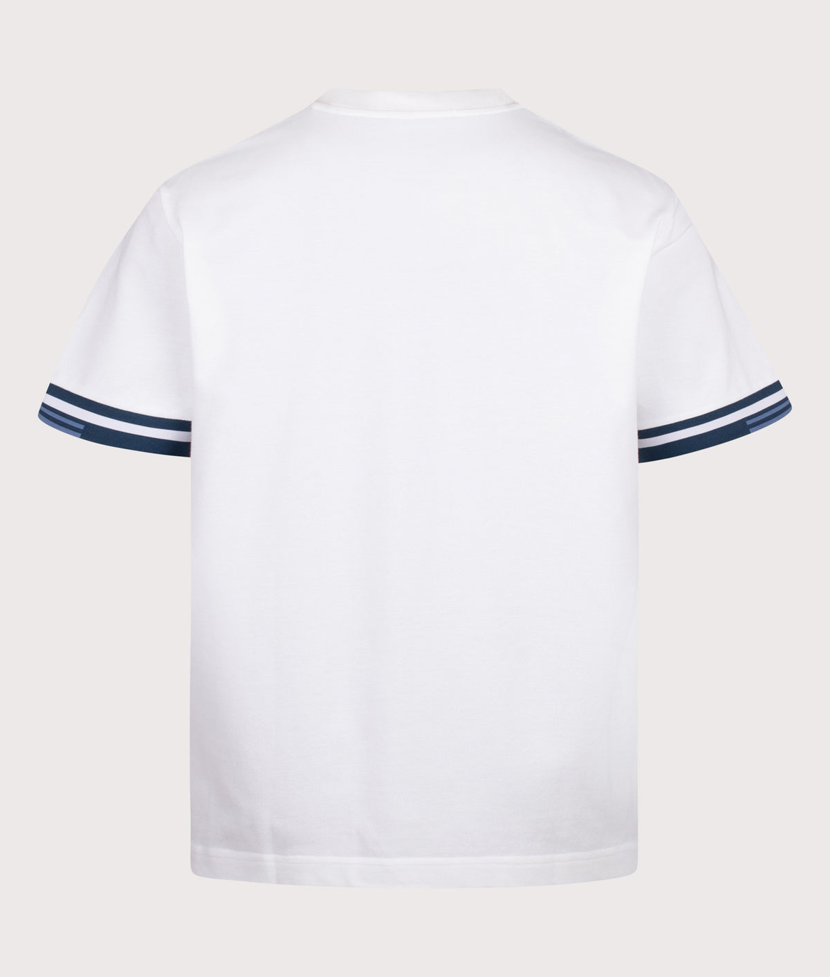 Fred Perry release the Relaxed Fit Tipped Cuff Pique T-Shirt in White at EQVVS Menswear. Back shot.