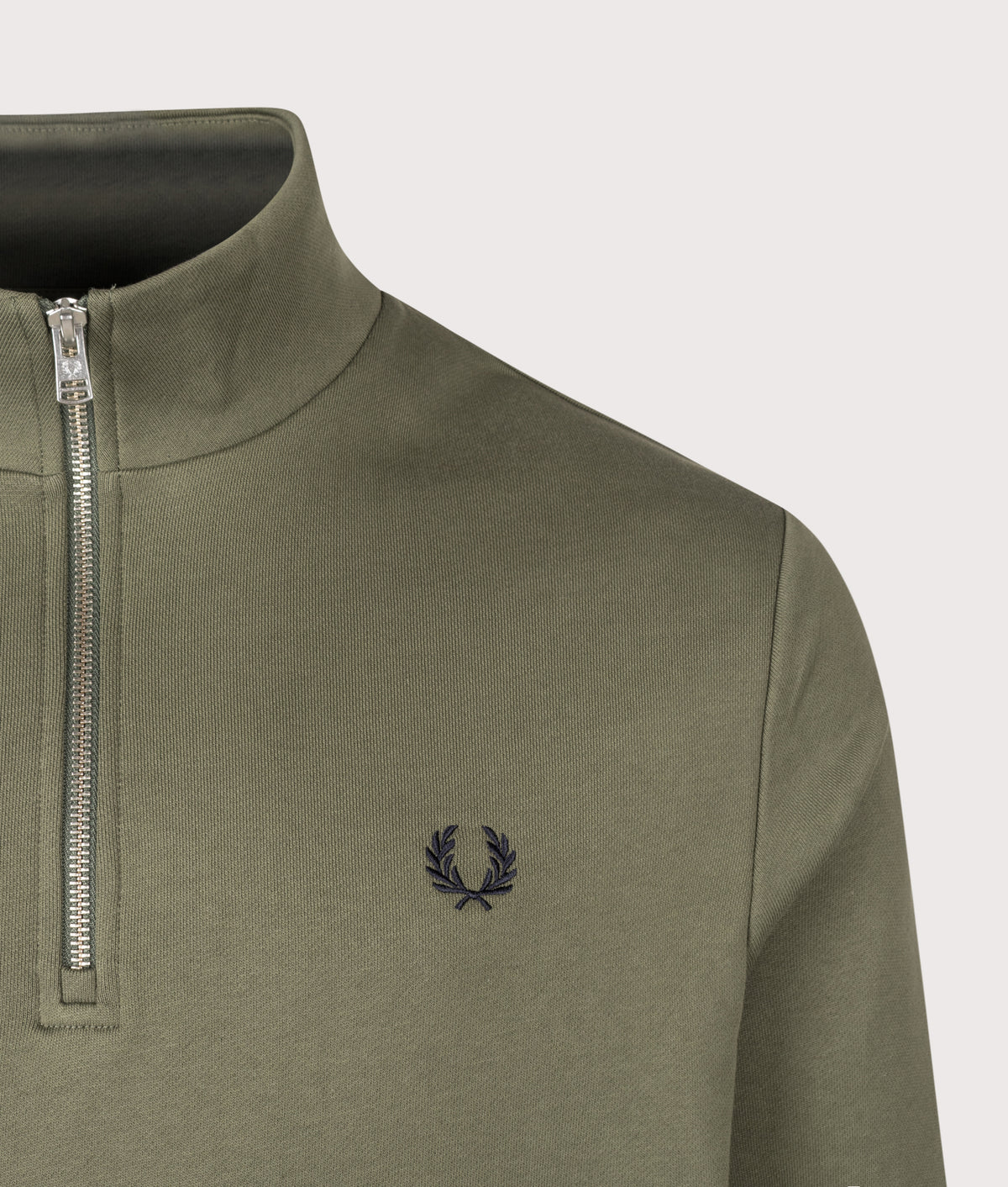 Fred Perry Regular Fit Quarter Zip Sweatshirt in Laurel Wreath Green, Slate and Navy at EQVVS Menswear. Detail shot.