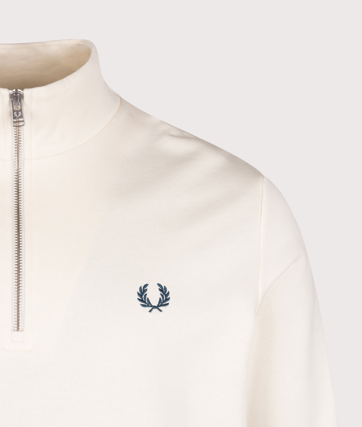 Fred Perry Regular Fit Quarter Zip Sweatshirt in Ecru and Mod Blue at EQVVS Menswear.  Detail shot.
