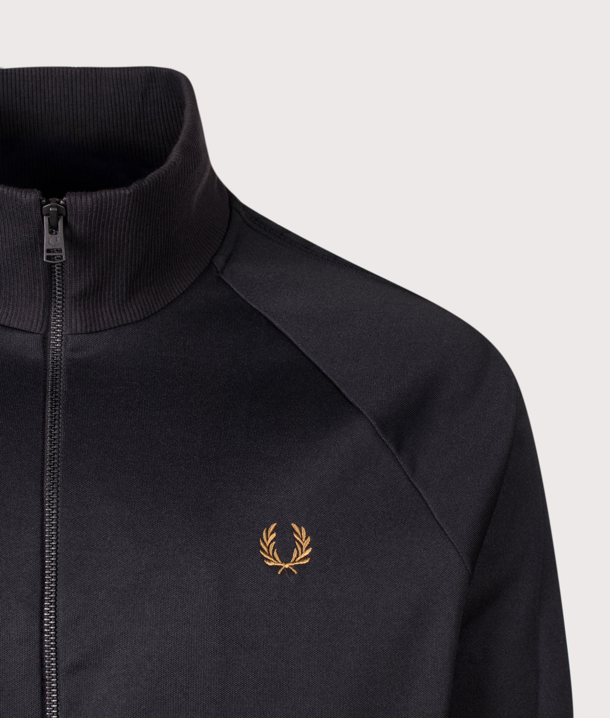 Fred Perry Regular Fit Cable Tape Track Jacket in Black at EQVVS Menswear. Detail shot.