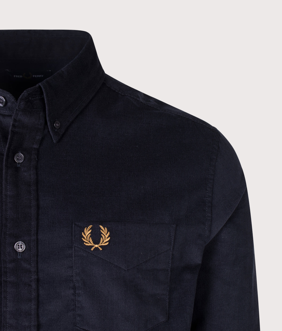 Fred Perry Regular Fit Needle Cord Shirt in Navy at EQVVS Menswear. Detail shot.