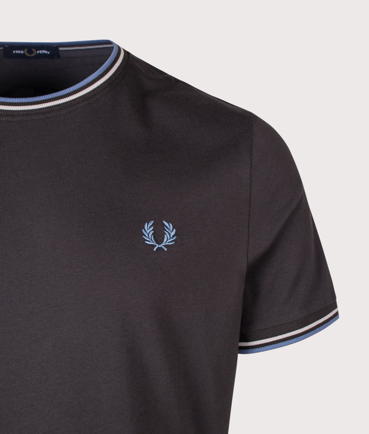 Fred Perry Twin Tipped T-Shirt in Anchor Grey, Ace Blue and Slate at EQVVS Menswear. Detail shot.