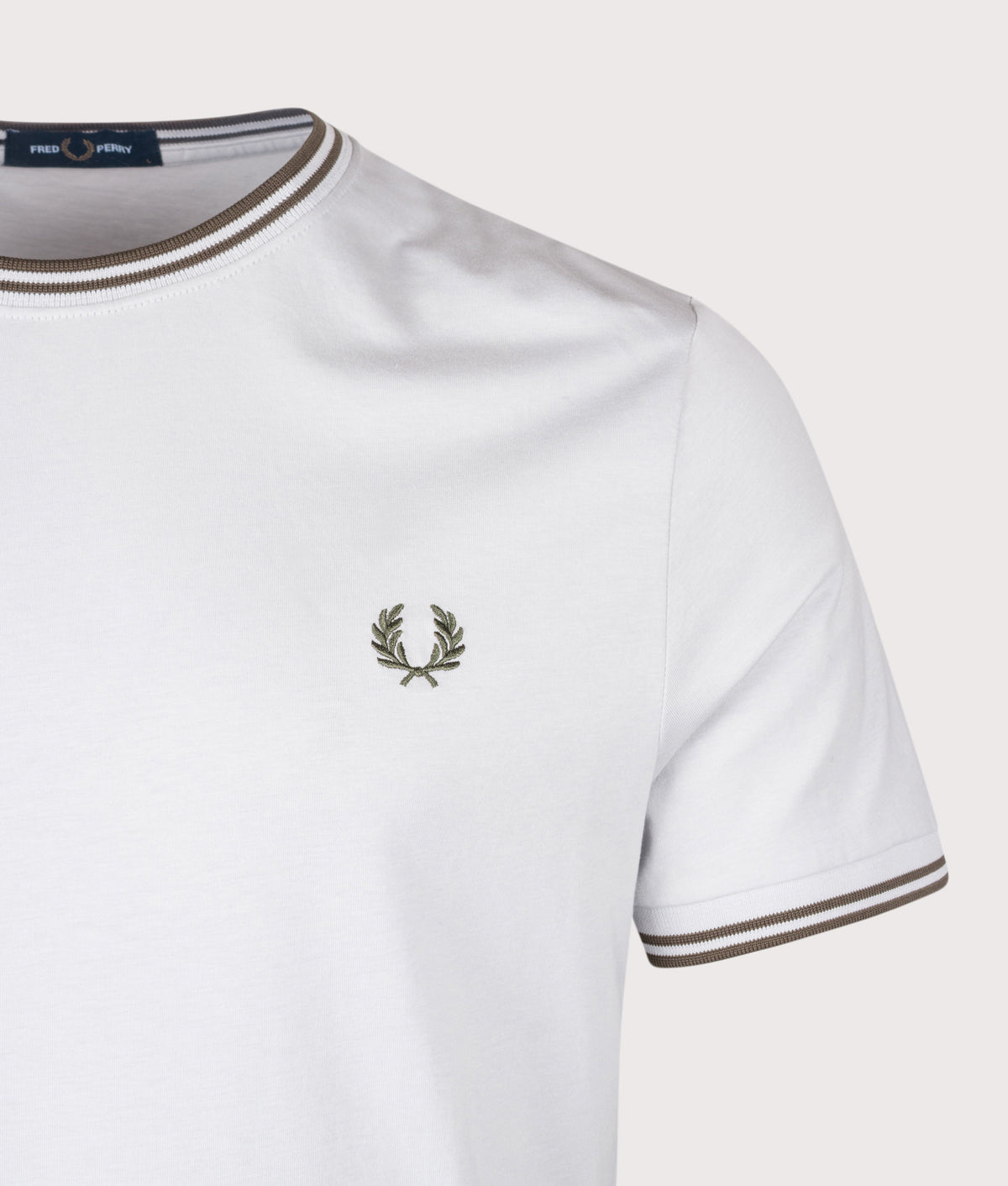Fred Perry Twin Tipped T-Shirt in Slate and Laurel Wreath Green at EQVVS Menswear. Detail shot.