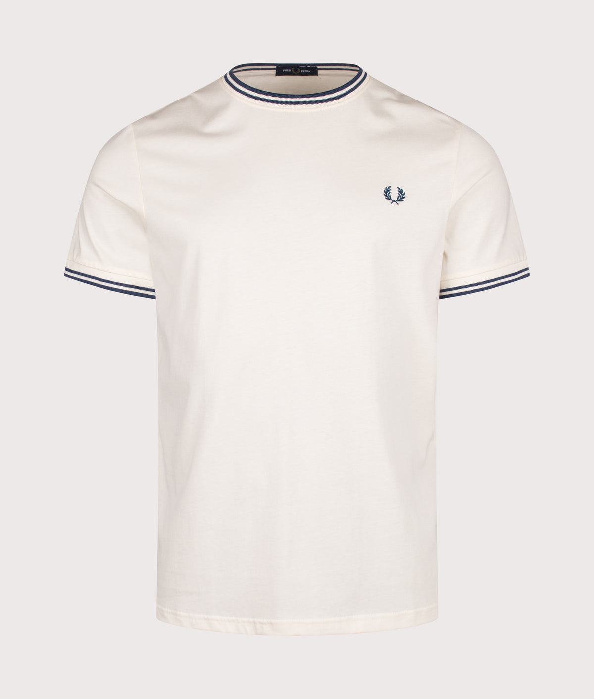 Fred Perry Twin Tipped T-Shirt in Ecru and Mod Blue at EQVVS Menswear. Front shot.