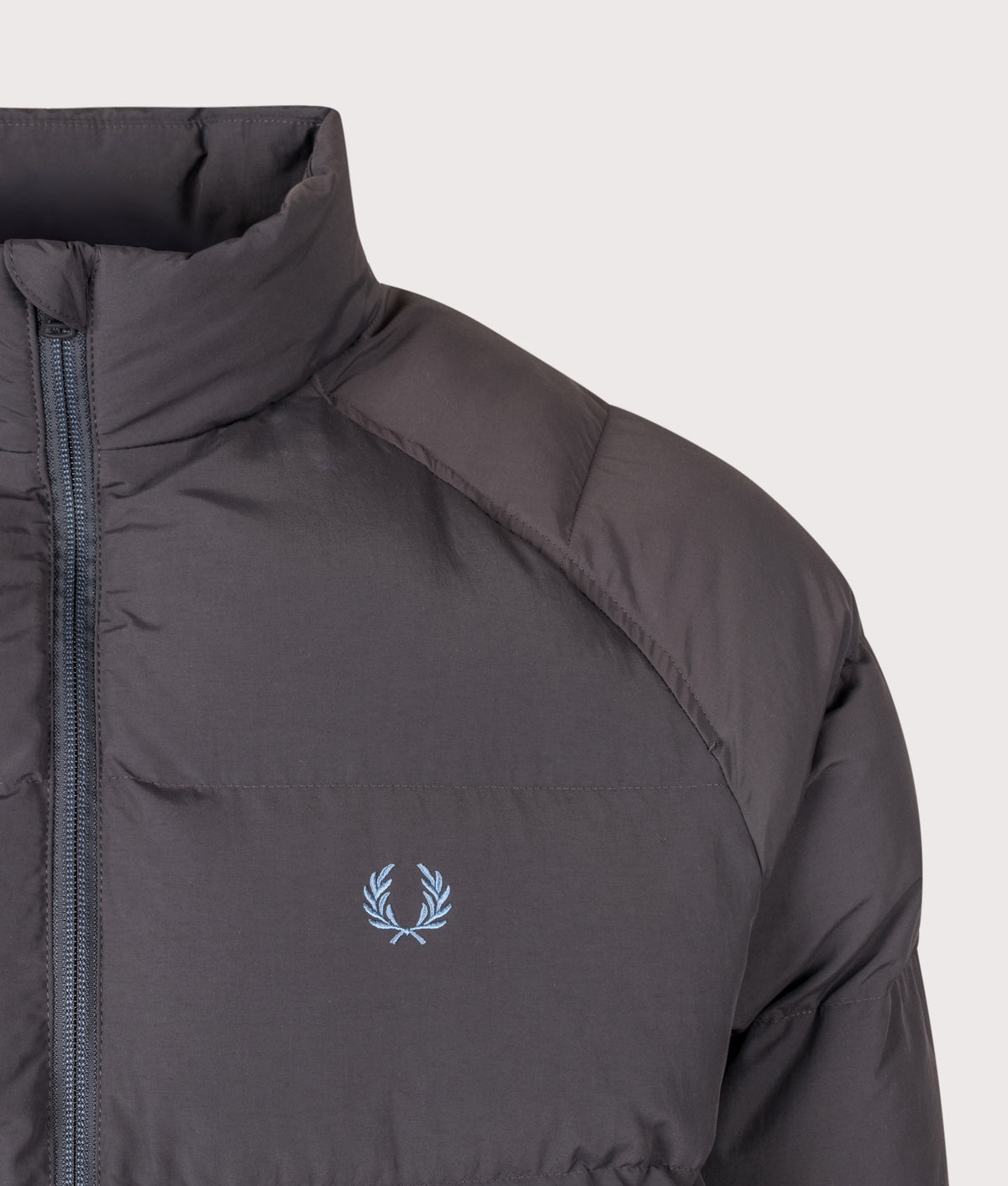 Fred Perry Regular Fit Raglan Sleeve Padded Jacket in Anchor grey at EQVVS Menswear. Detail shot.