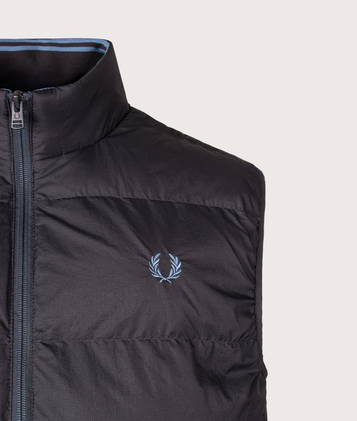 Fred Perry Regular Fit Insulated Gilet in Anchor Grey at EQVVS Menswear. Detail shot.