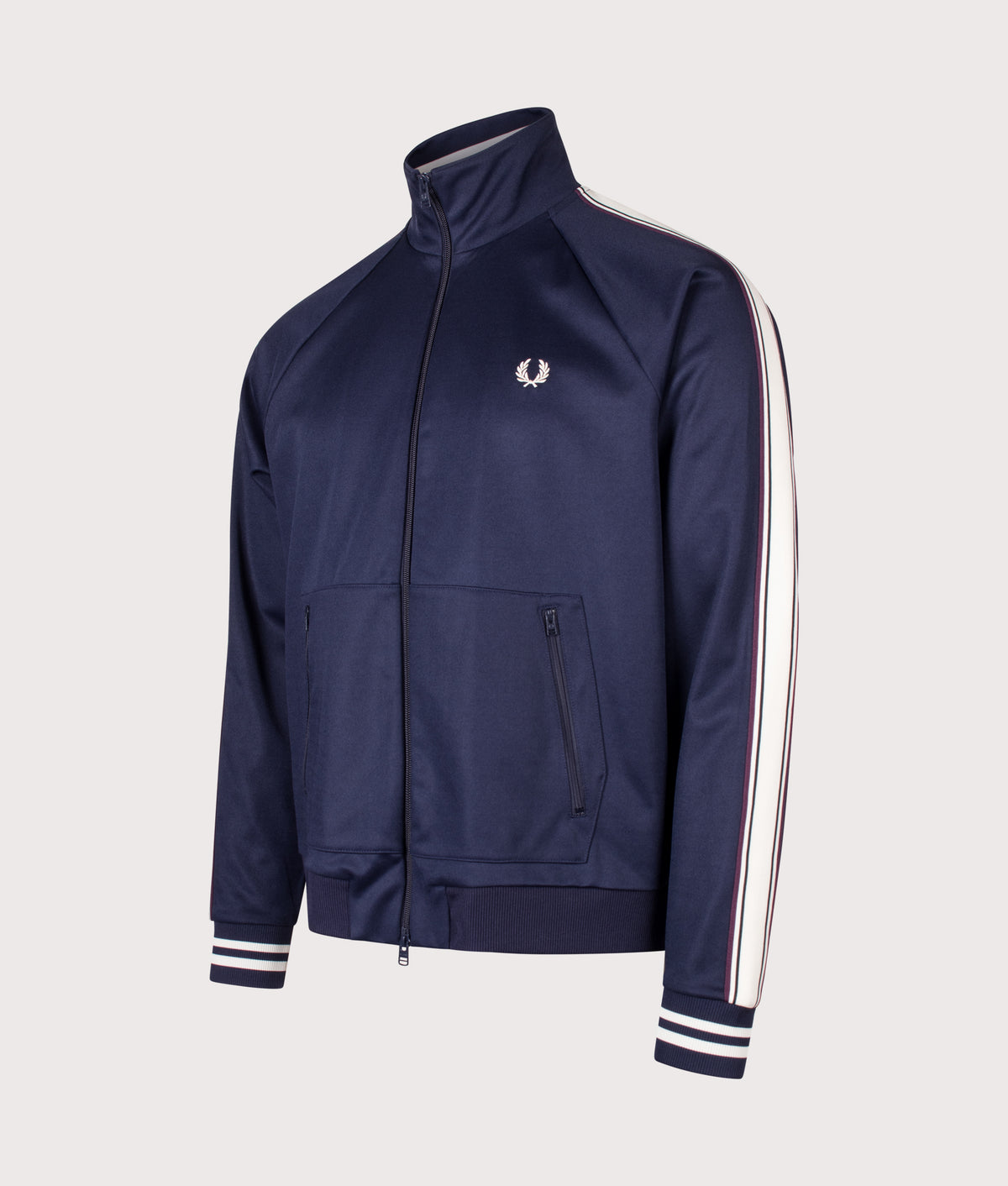 Fred Perry Regular Fit Bold Tipped Track Jacket in Twilight Navy at EQVVS Menswear. Angled front shot.
