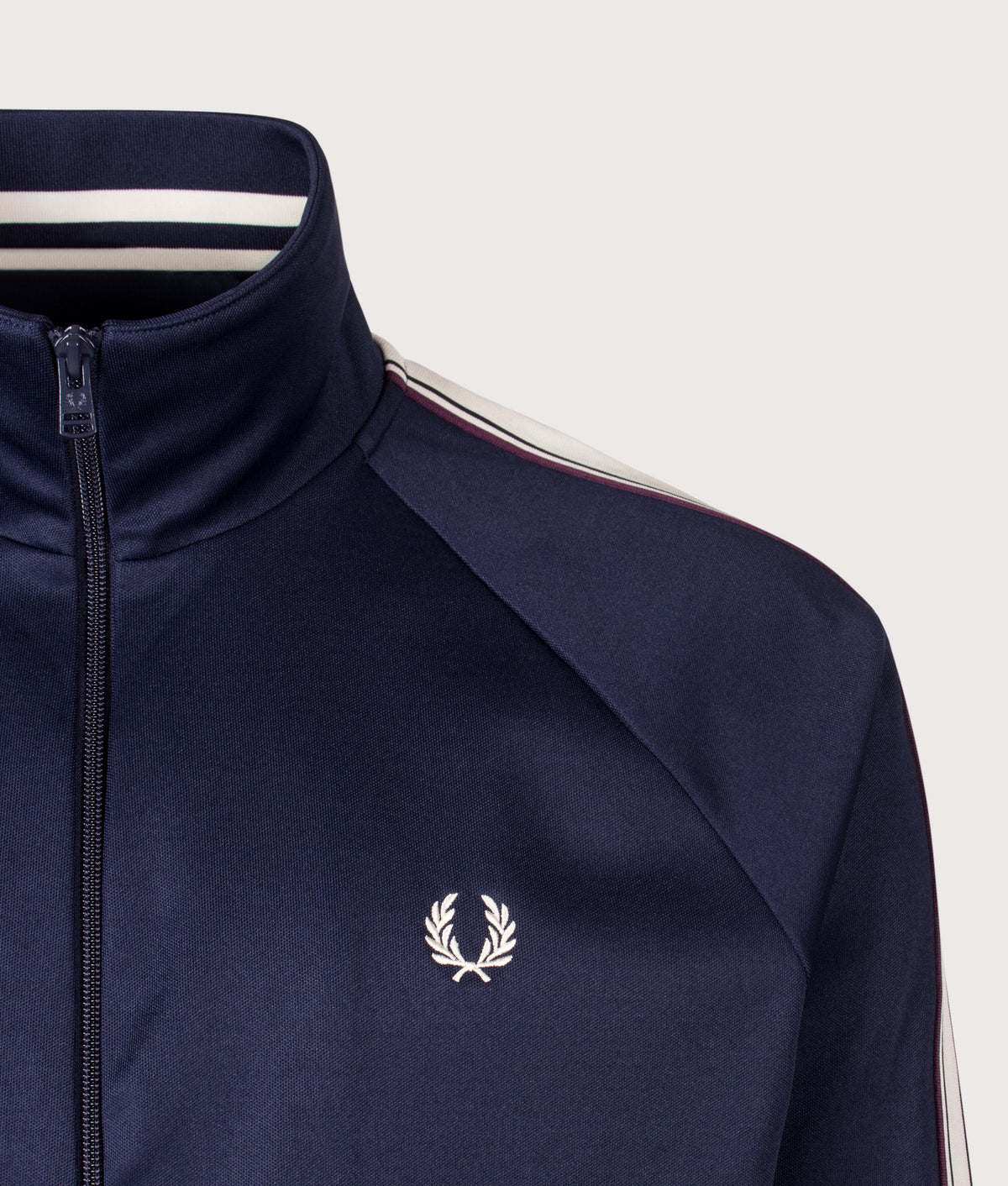 Fred Perry Regular Fit Bold Tipped Track Jacket in Twilight Navy at EQVVS Menswear. Detail shot.