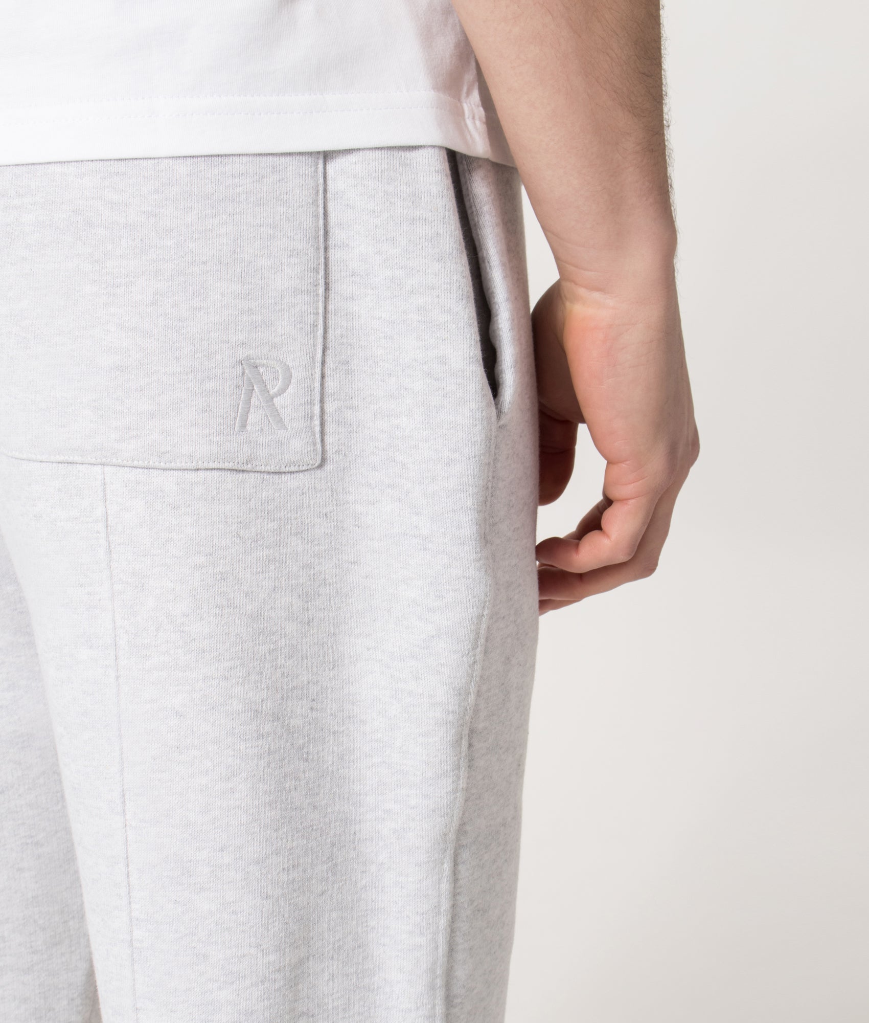 REPRESENT Initial Joggers in Ice Grey Marl at EQVVS Menswear. Back detail model shot 