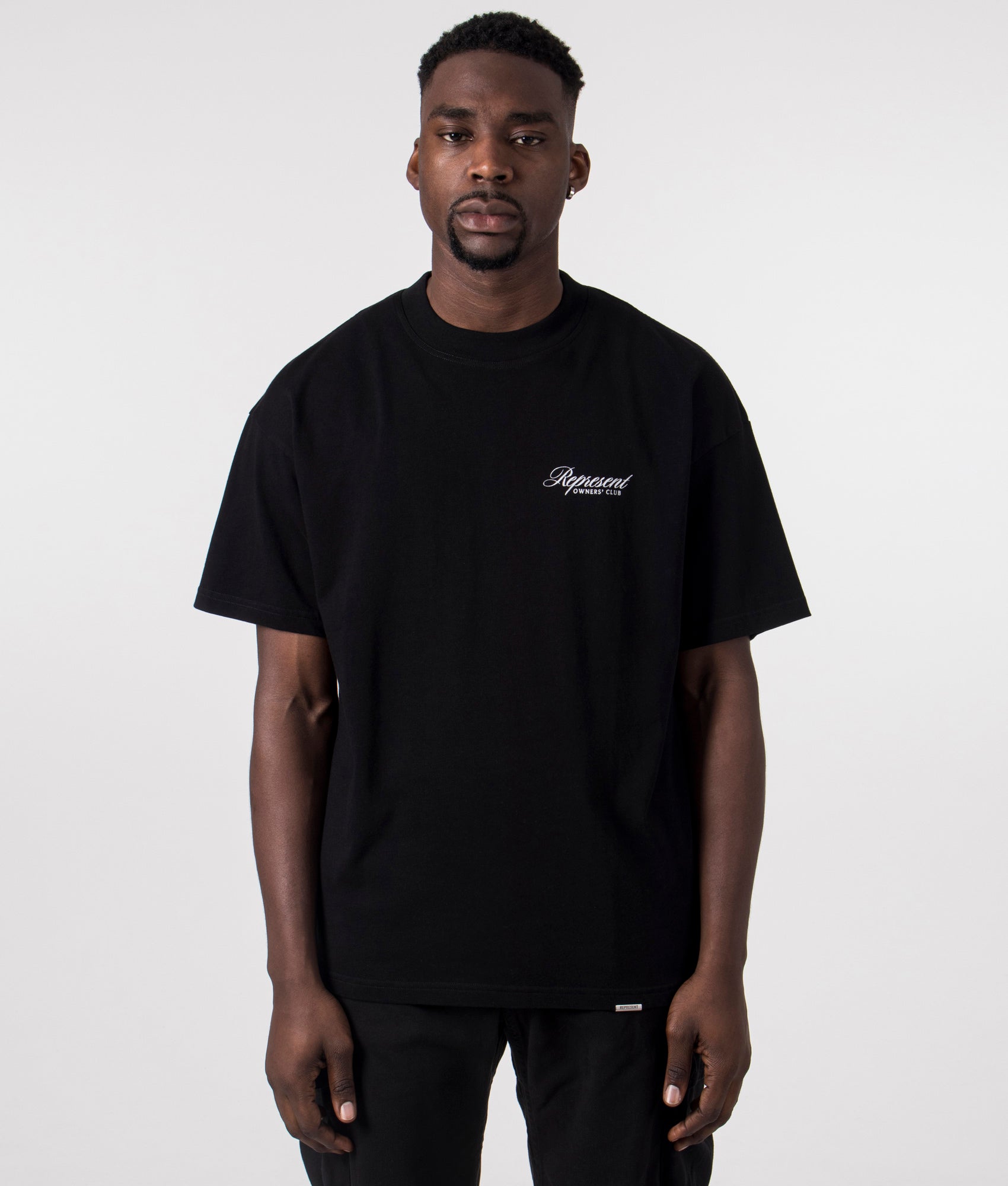 Represent Owners Club Script T-Shirt in Black by Represent at EQVVS. Front Detail Model Shot.