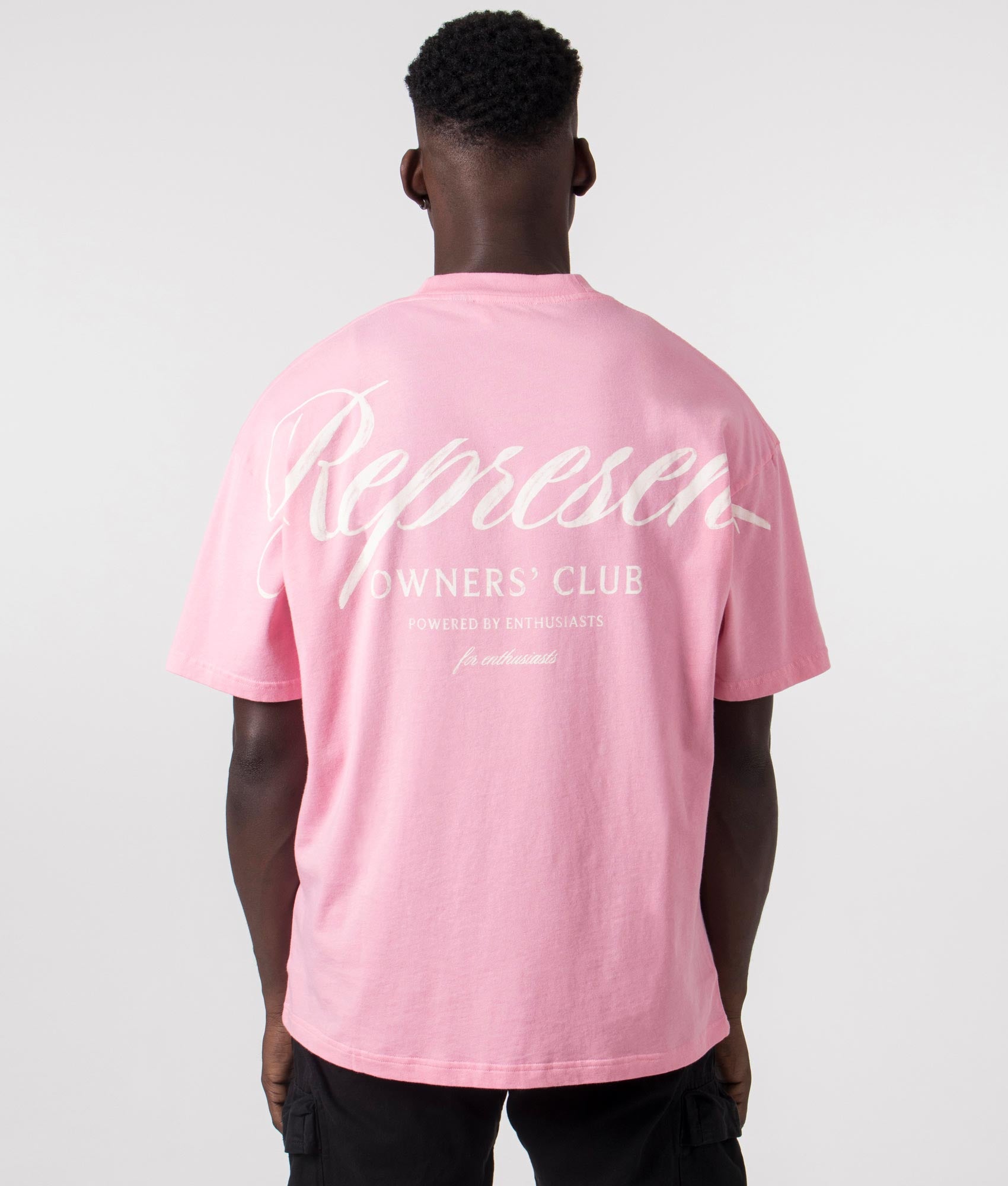 Represent Owners Club Script T-Shirt in Pink by Represent at EQVVS. Back Detail  Model Shot. 