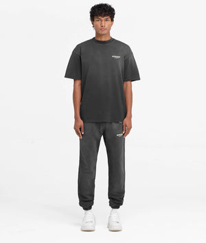 Represent Owners Club Sweatpants. Shot by EQVVS. Front model full shot.