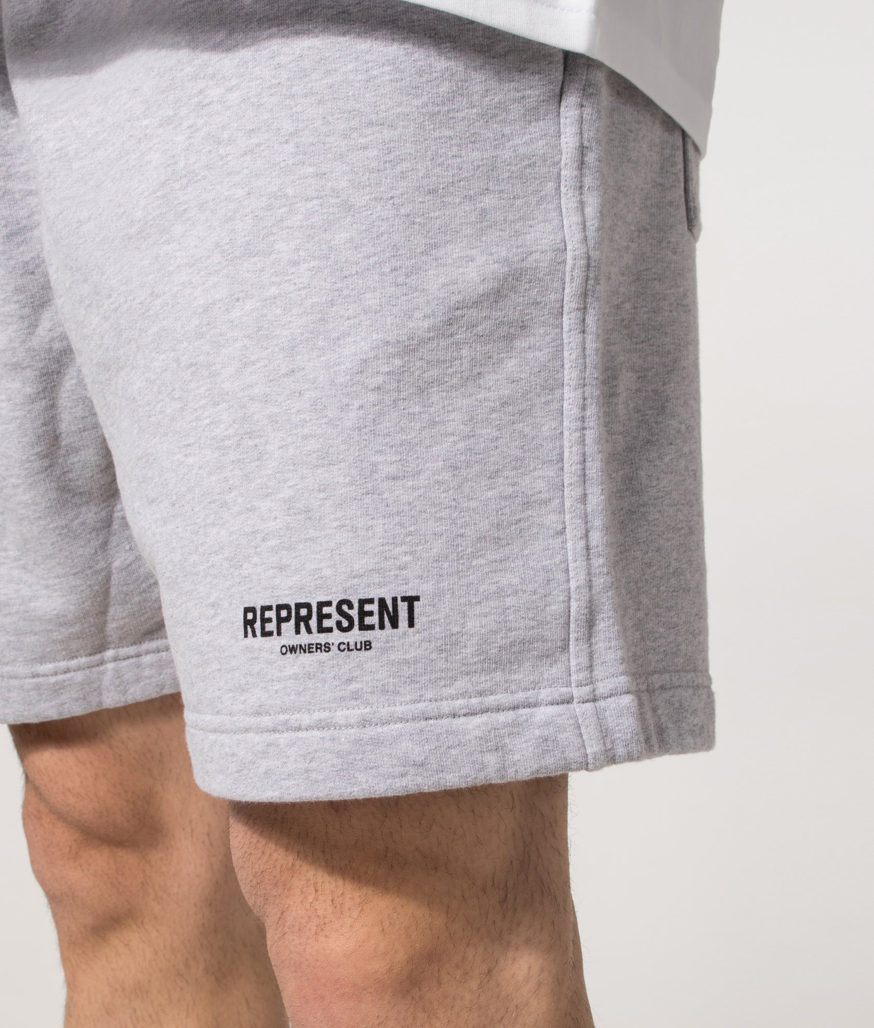 Relaxed Fit Owners Club Shorts in Ash Grey/Black | 100% Cotton | REPRESENT | Front angle detail model shot 