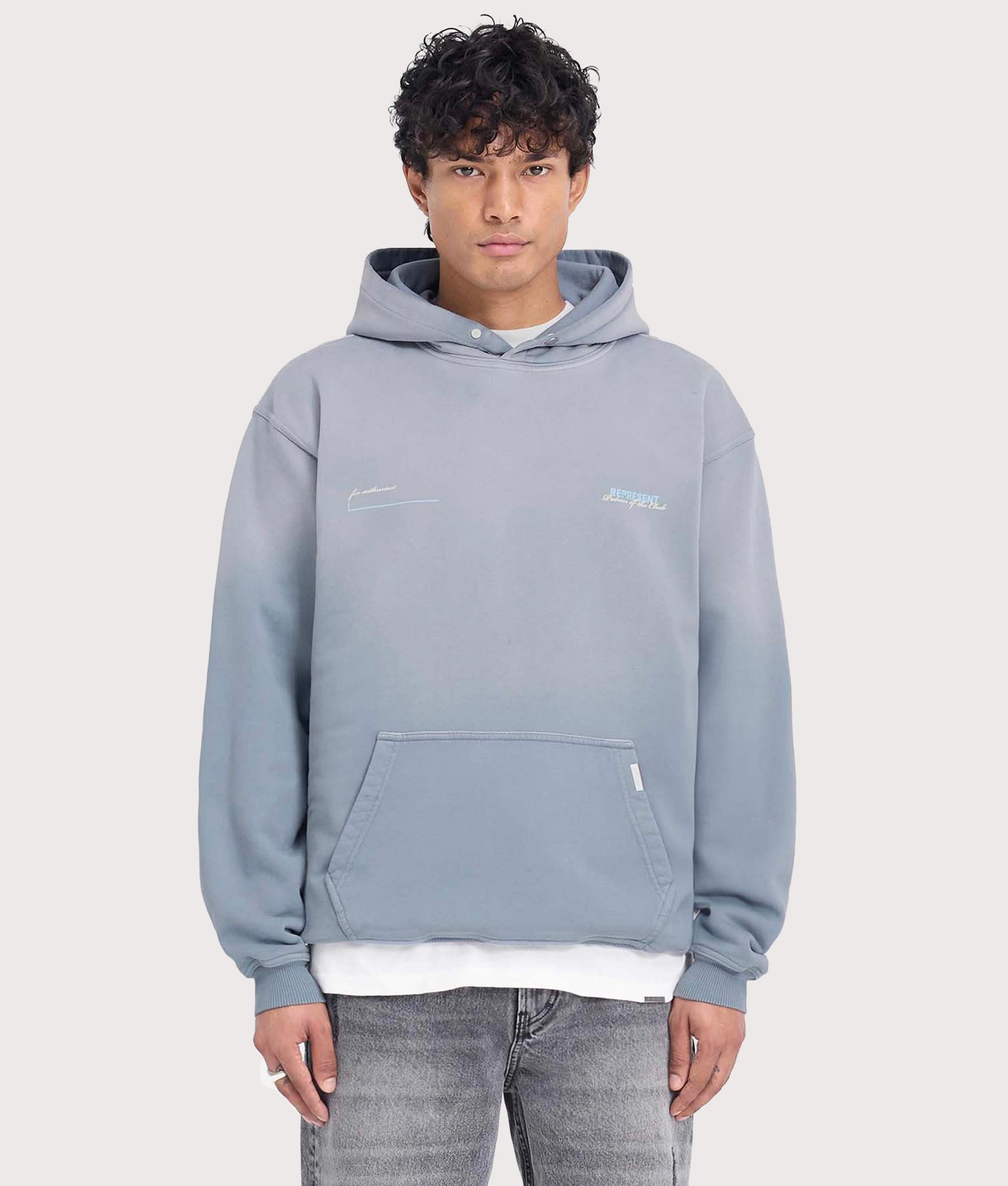 REPRESENT Patron Of The Club Hoodie in washed grey at EQVVS Menswear. Model front shot.
