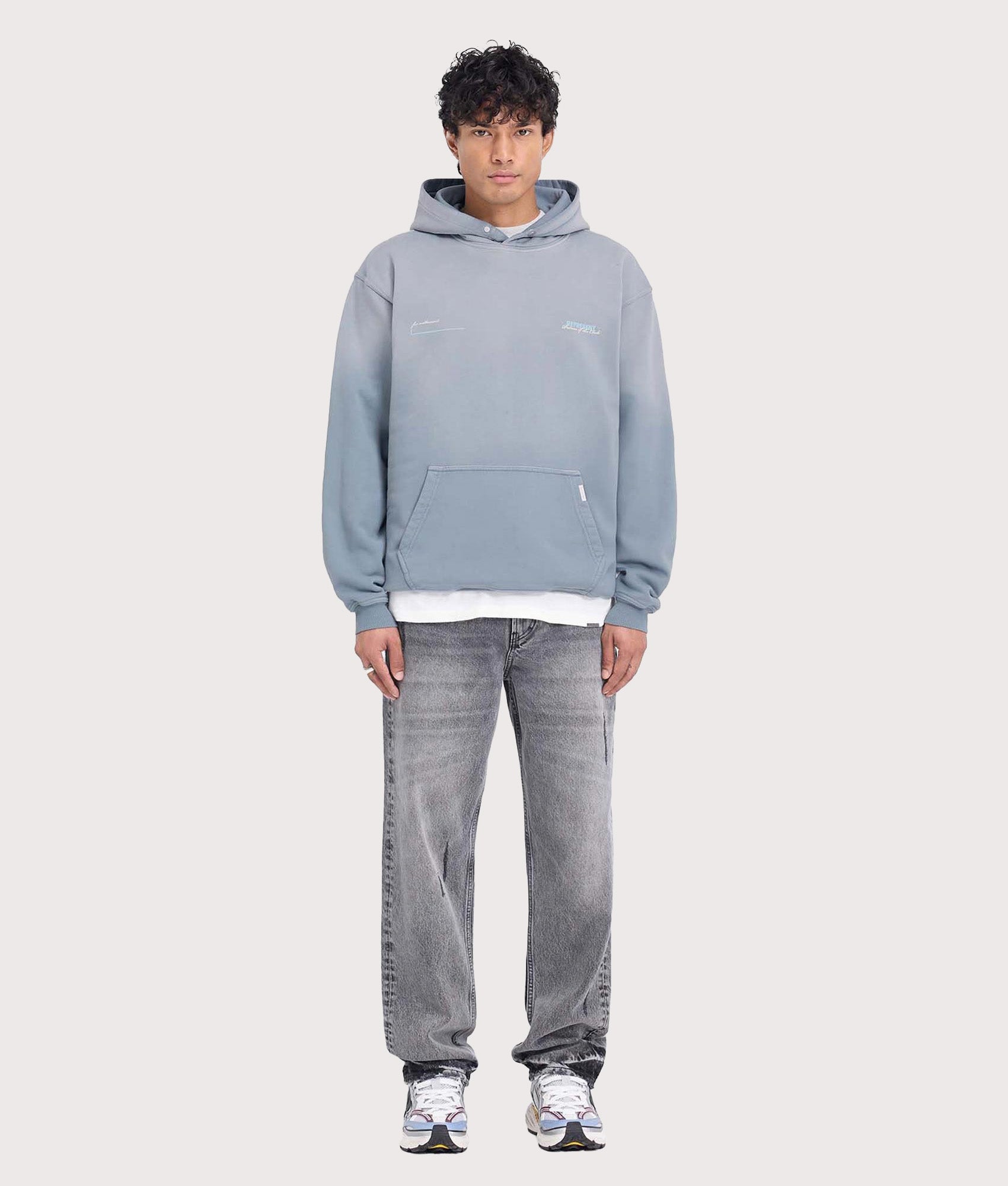 REPRESENT Patron Of The Club Hoodie in washed grey at EQVVS Menswear.  Model full front shot.