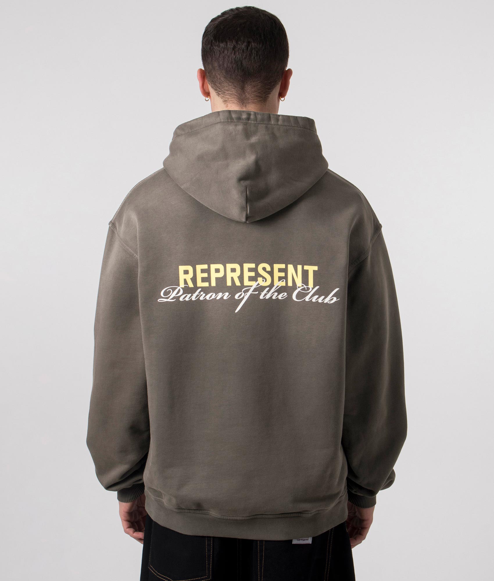 Washed Olive Patron of the Club Hoodie by REPRESENT. Shot at EQVVS. Reverse shot. 