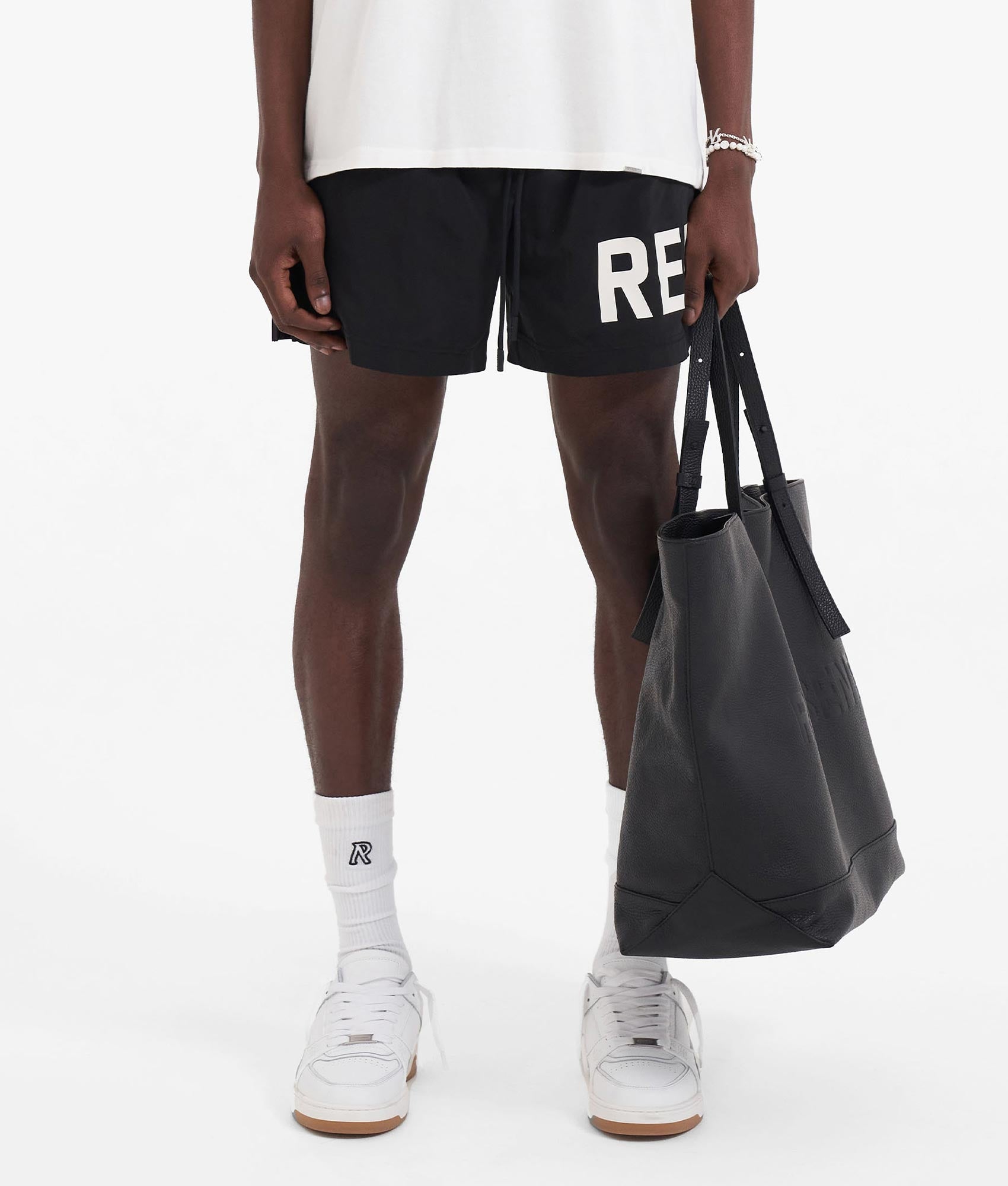 Polo Ralph Lauren Represent Swim Shorts in Black. Shot at EQVVS. Front model shot 