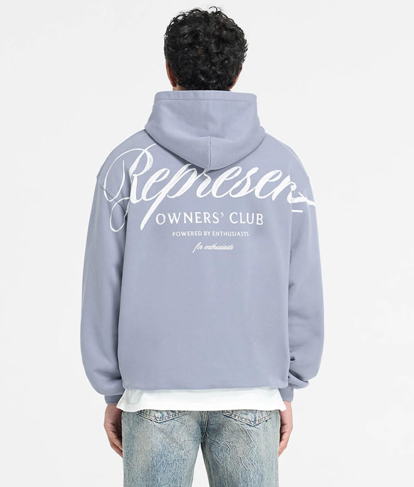 Represent Owners Club Script Hoodie. Shot by EQVVS. Back Print Model Shot.