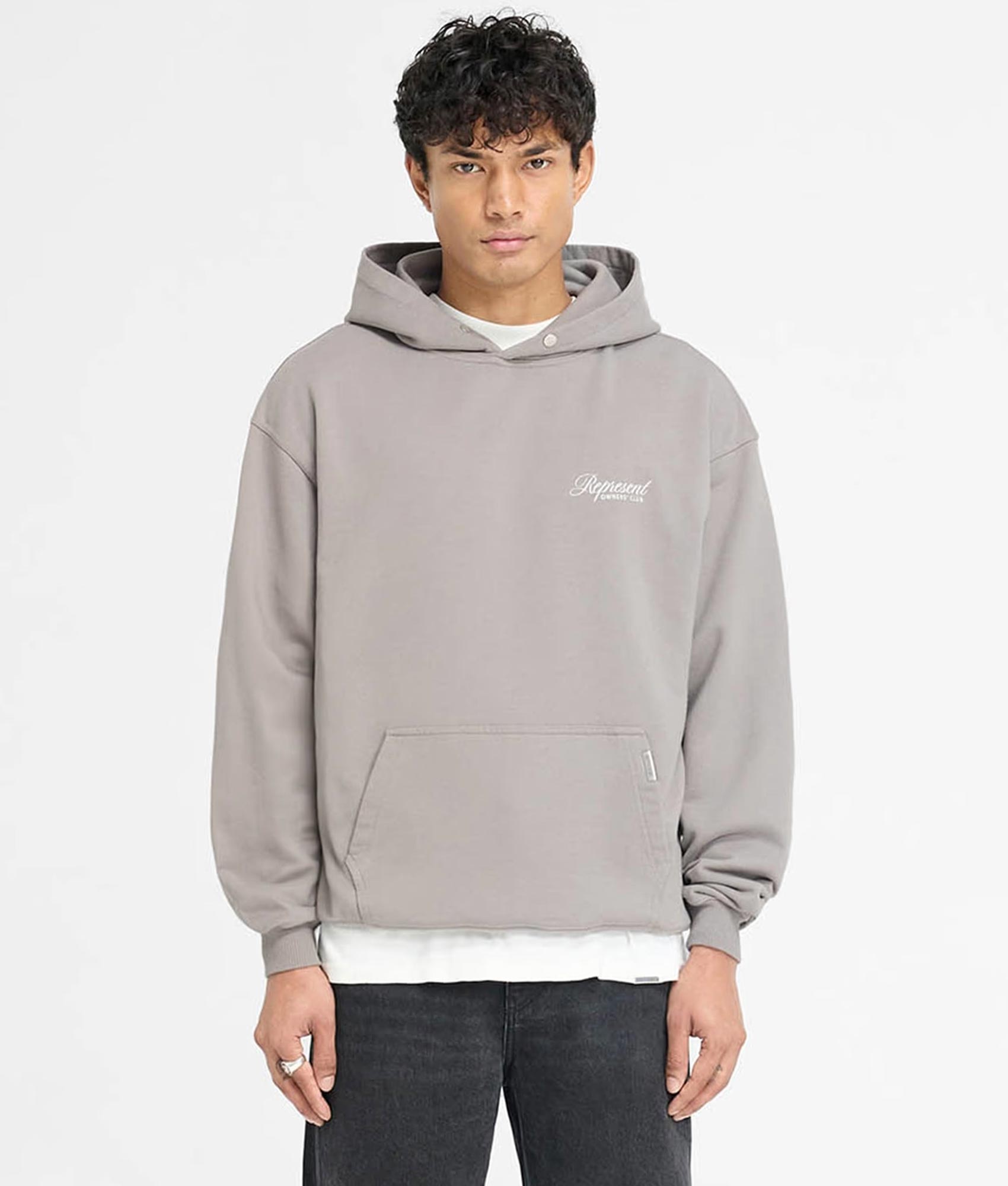 Represent Owners Club Script Hoodie. Shot by EQVVS. Front Model Shot.