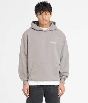 Represent Owners Club Script Hoodie. Shot by EQVVS. Front Model Shot.
