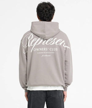 Represent Owners Club Script Hoodie. Shot by EQVVS. Back Print Model Shot.