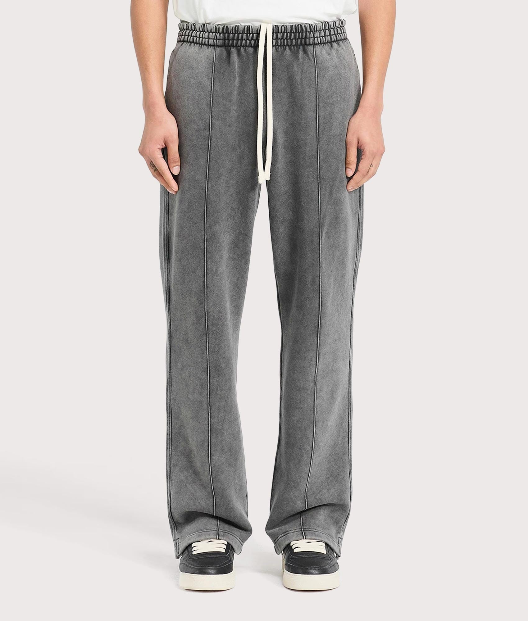 Initial Joggers by Represent in Vintage Grey. Shot by EQVVS. Front model shot.
