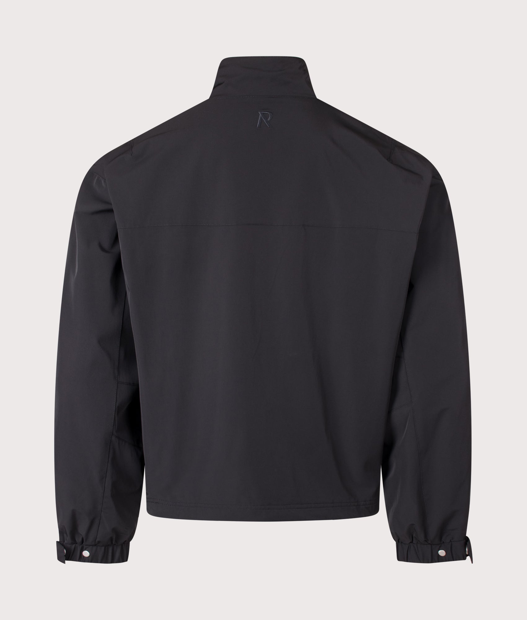 Represent Oversized Initial Nylon Track Jacket in Jet Black at EQVVS Menswear. Back shot.