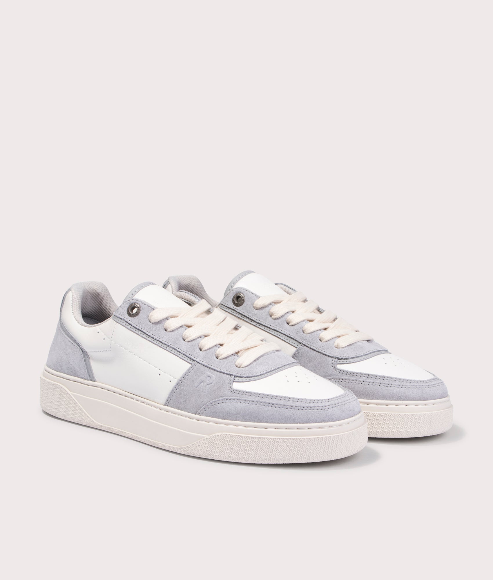 REPRESENT Initial Suede Sneakers in Light Grey and Flat White. EQVVS Angle Shot.