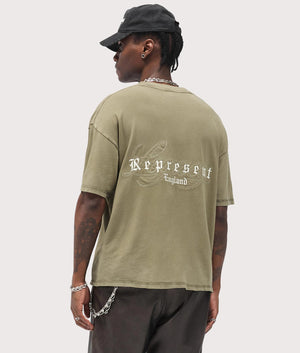 Legacy T-Shirt by Represent in Aged Khaki. Shot by EQVVS. Back model shot.