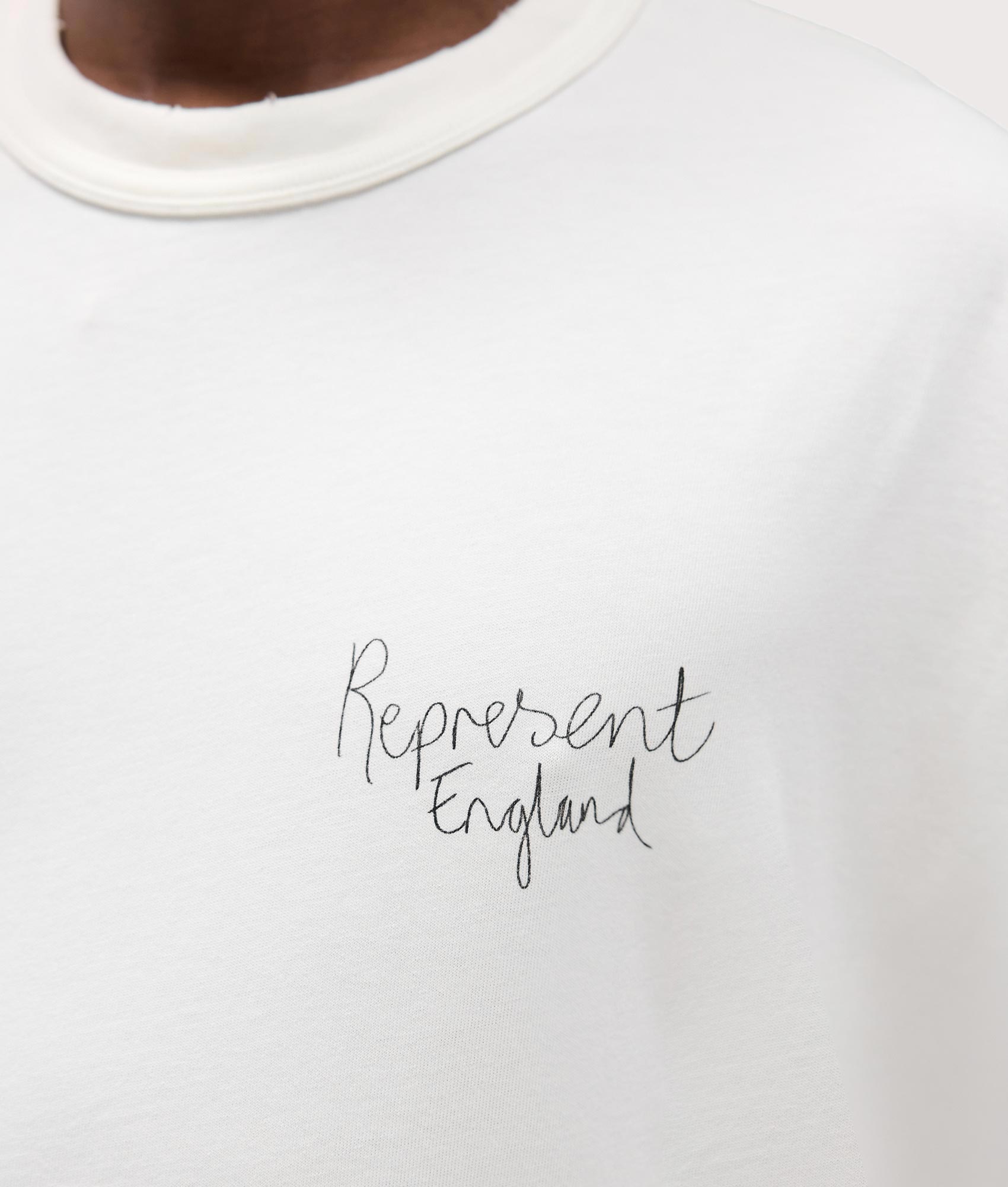 Relaxed Fit Hand Drawn Thoroughbred Dogs T-Shirt in Washed Ecru . 100% Cotton | REPRESENT | EQVVS | Front model detail shot 2