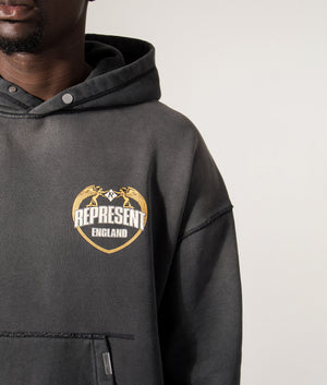 Represent Angel Border Hoodie by Represent in Stained Black. Shot by EQVVS. Detail model shot.