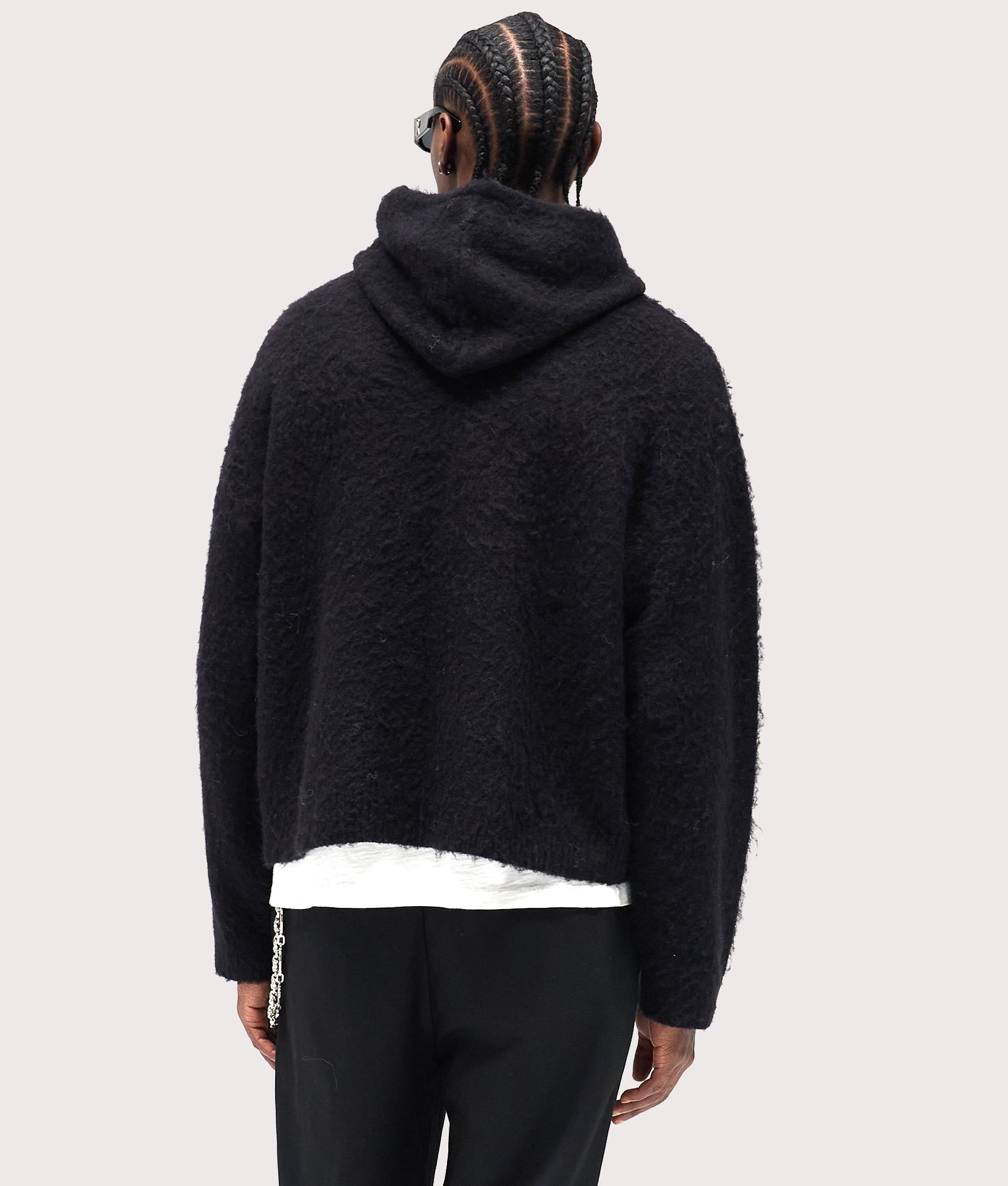 Textured Borg Hoodie by Represent in Jet Black. Shot by EQVVS. Back model shot.