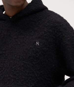 Textured Borg Hoodie by Represent in Jet Black. Shot by EQVVS. Detail model shot.